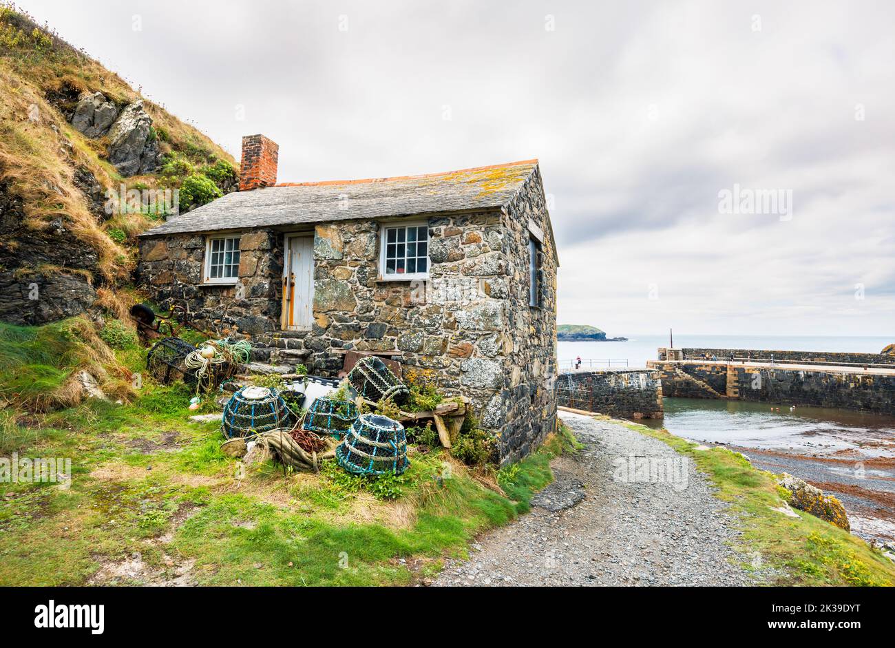 Harbour Cottage, le Net Loft Fishermen’s Cottage, un bâtiment classé du début du 19th siècle à Mullion Cove, à l’ouest de la péninsule Lizard, en Cornouailles Banque D'Images