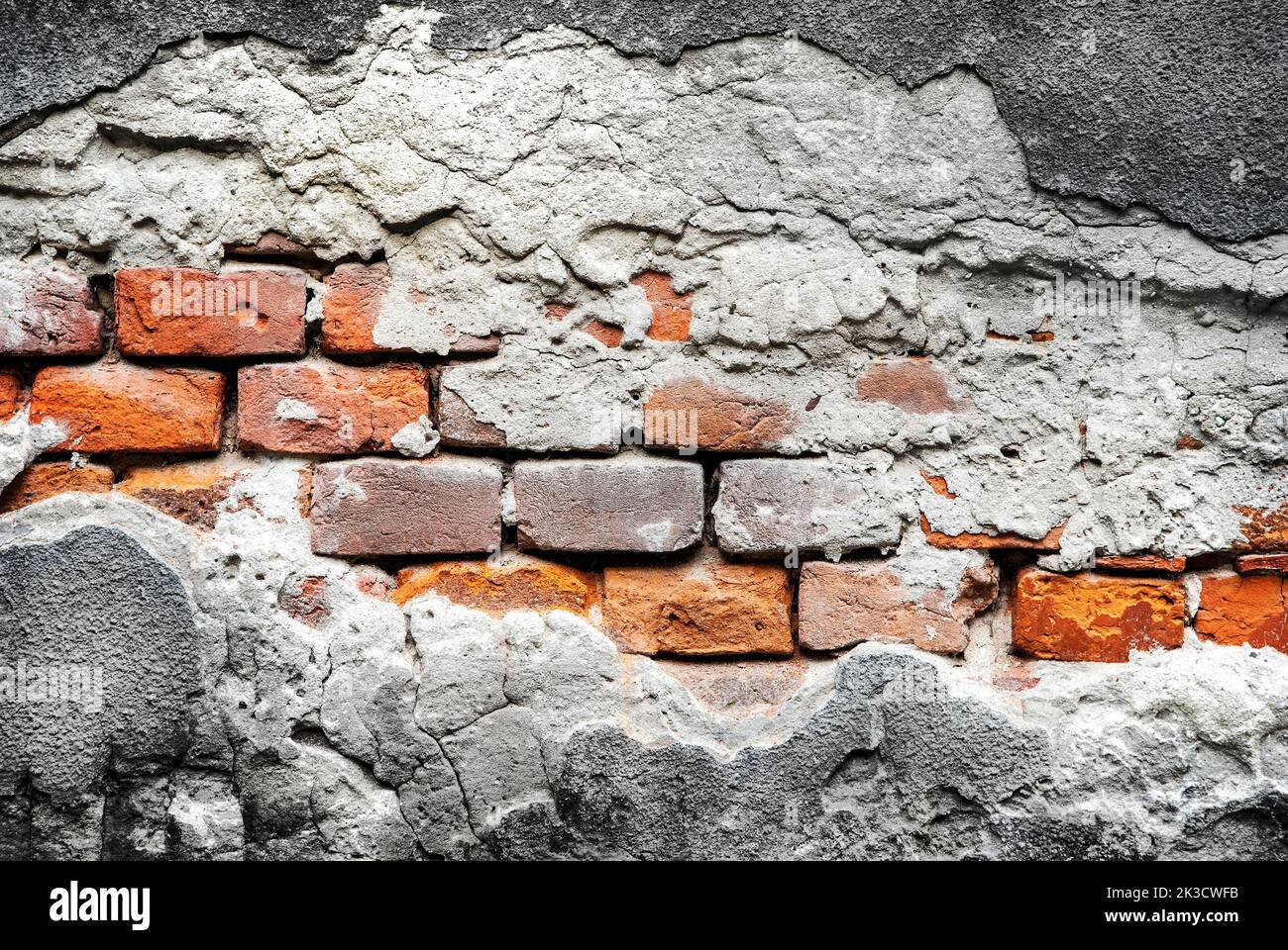 Texture de l'ancien mur de briques abîmé. Banque D'Images