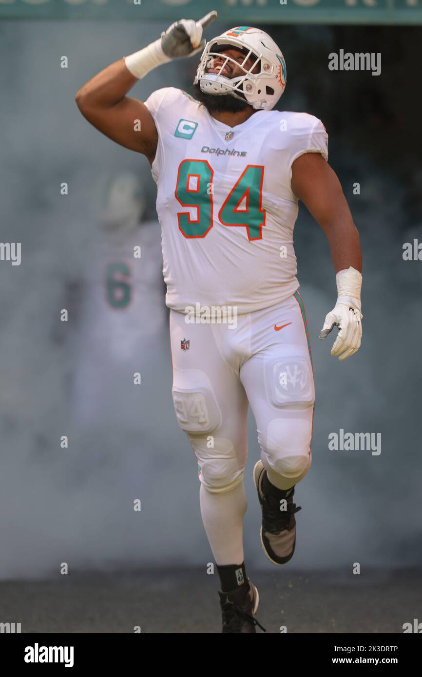 Miami Dolphins defensive tackle Christian Wilkins (94) laughs on the  sidelines during an NFL football game against the Philadelphia Eagles,  Saturday, Aug. 27, 2022, in Miami Gardens, Fla. (AP Photo/Doug Murray Stock