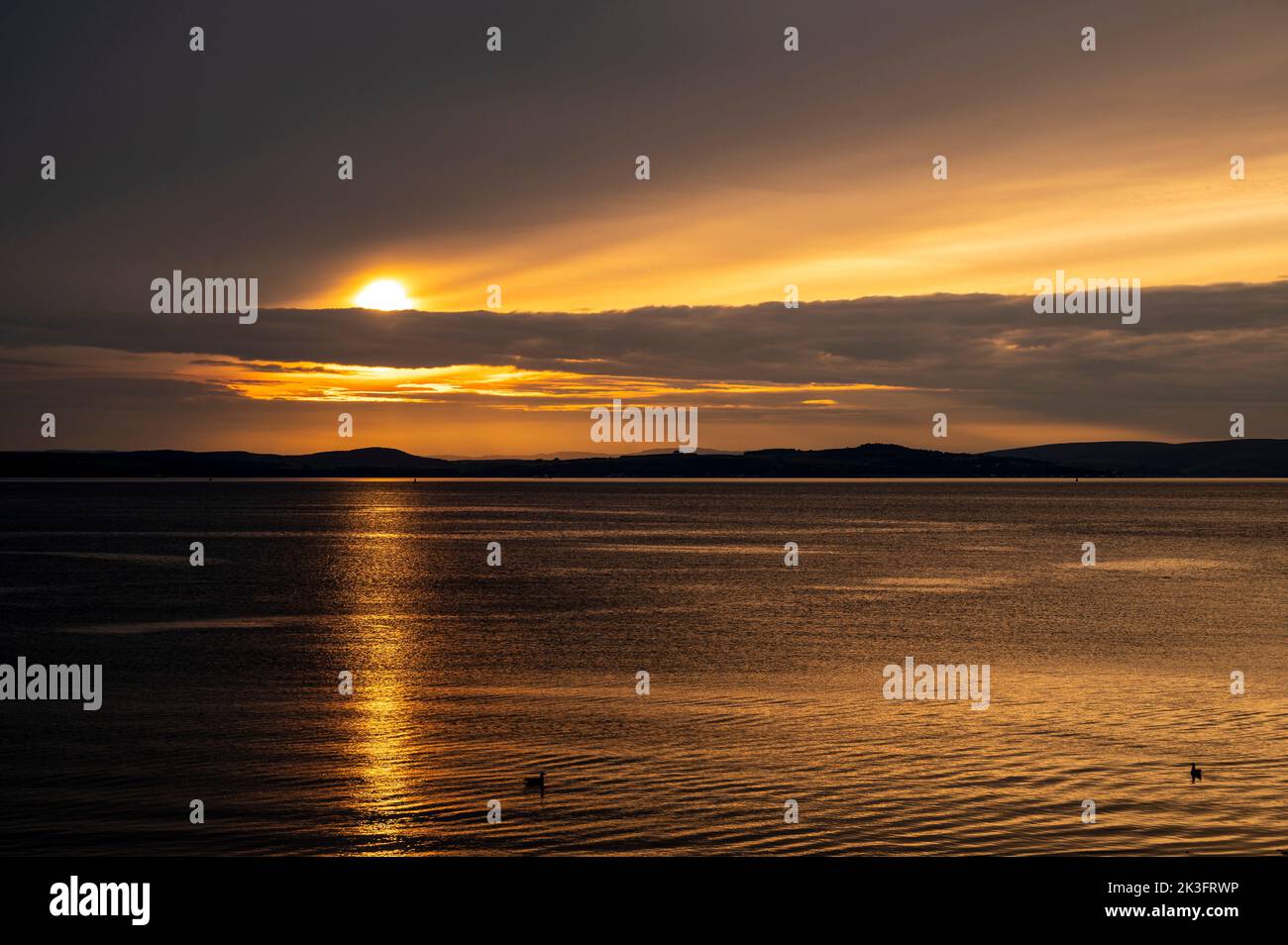 Coucher de soleil sur la côte d'Ayrshire, Largs, Écosse, Royaume-Uni Banque D'Images