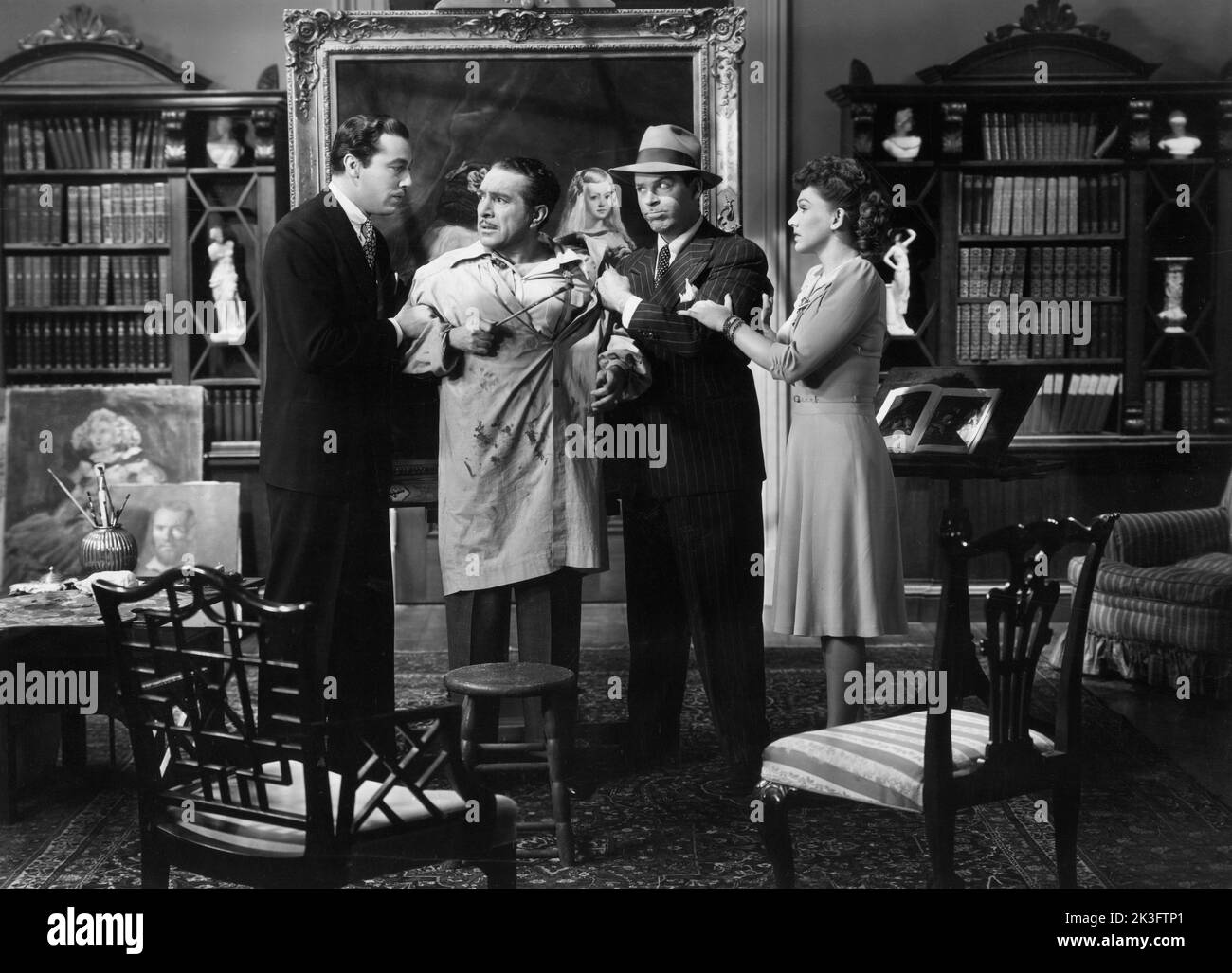Cesar Romero, J. Carrol Naish, Milton Berle, Rose Hobart, sur le tournage du film, « Un gentleman au cœur », 20th Century-Fox, 1942 Banque D'Images
