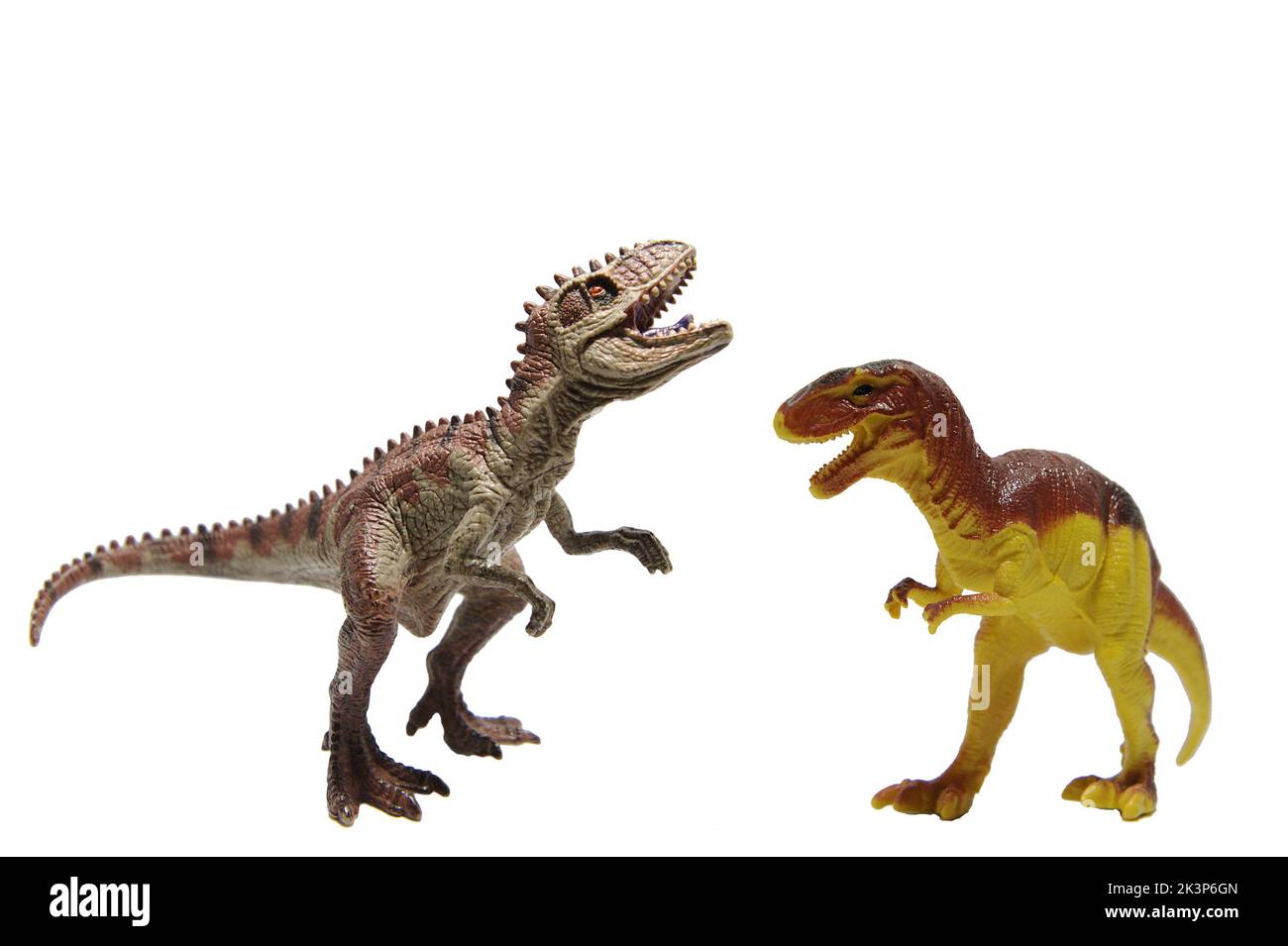Jouet dinosaure en plastique isolé sur fond blanc Banque D'Images