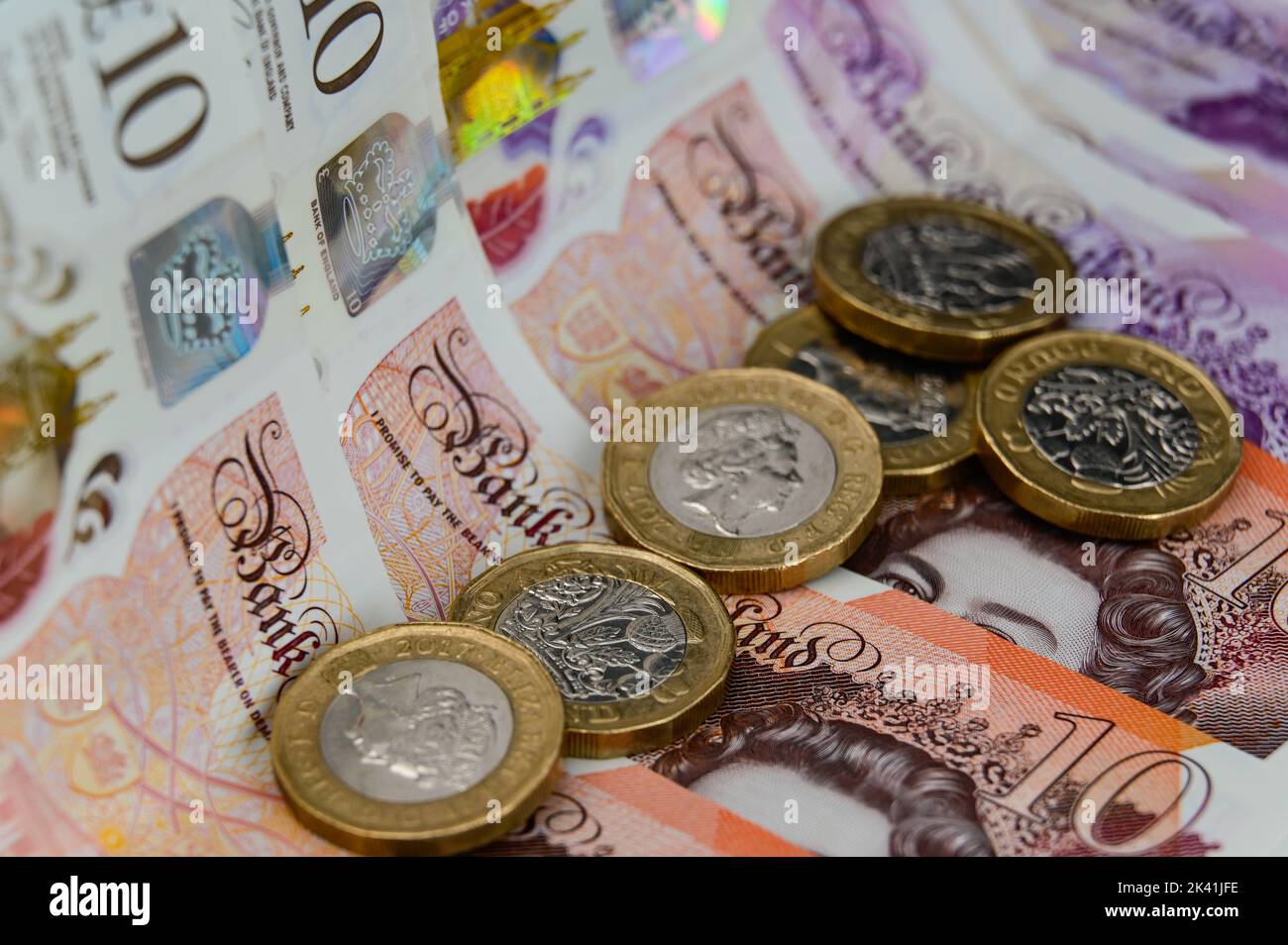 GBP Money British une livre pièces et dix et vingt livres billets monnaie Banque D'Images
