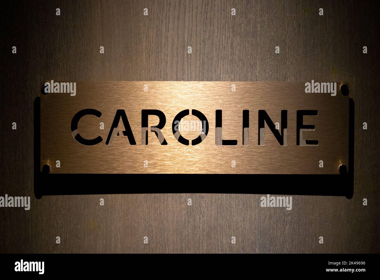 Plaque d'identification en métal Caroline de couleur dorée Banque D'Images