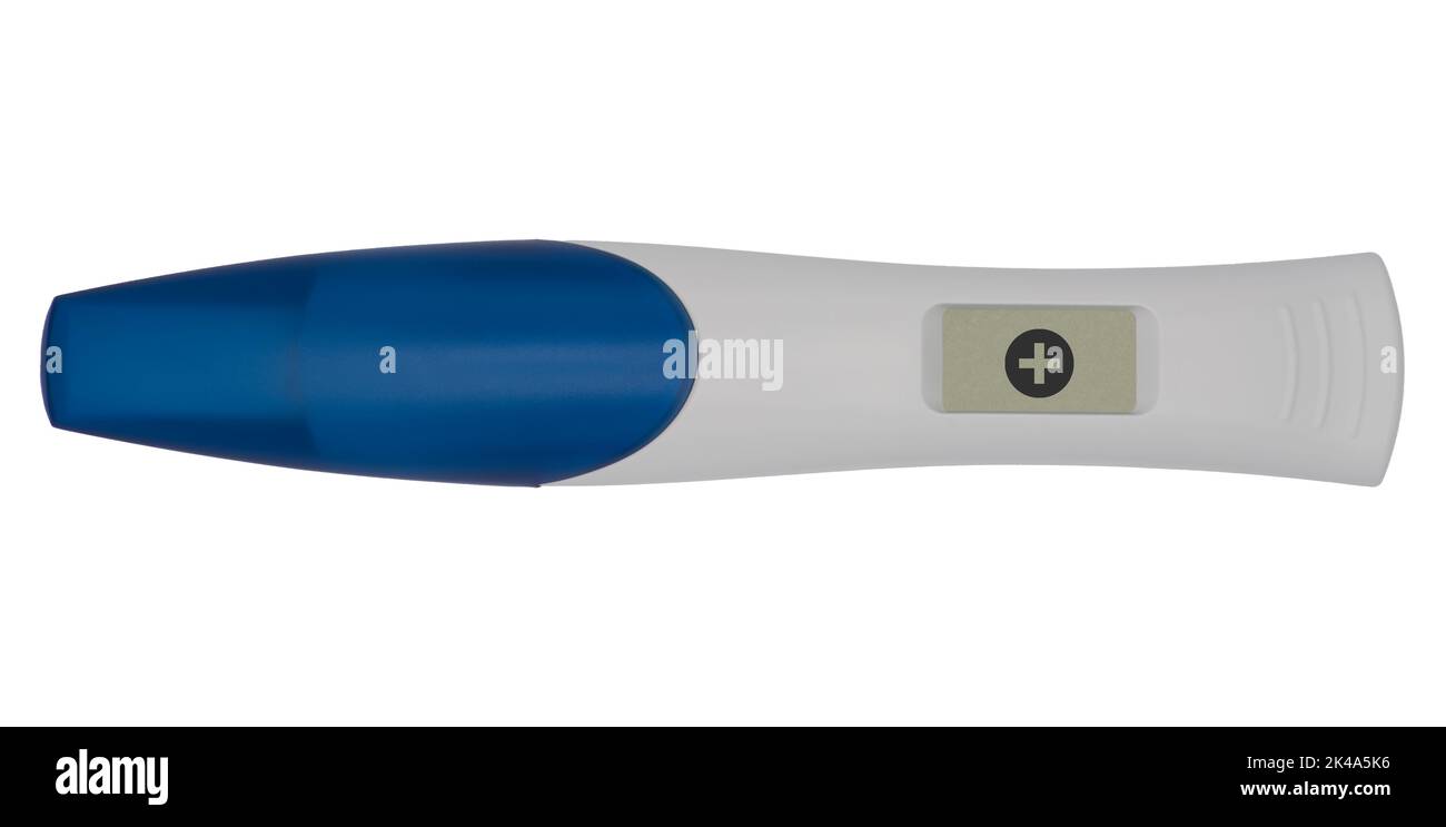 Test de grossesse positif (+) sur fond blanc Banque D'Images
