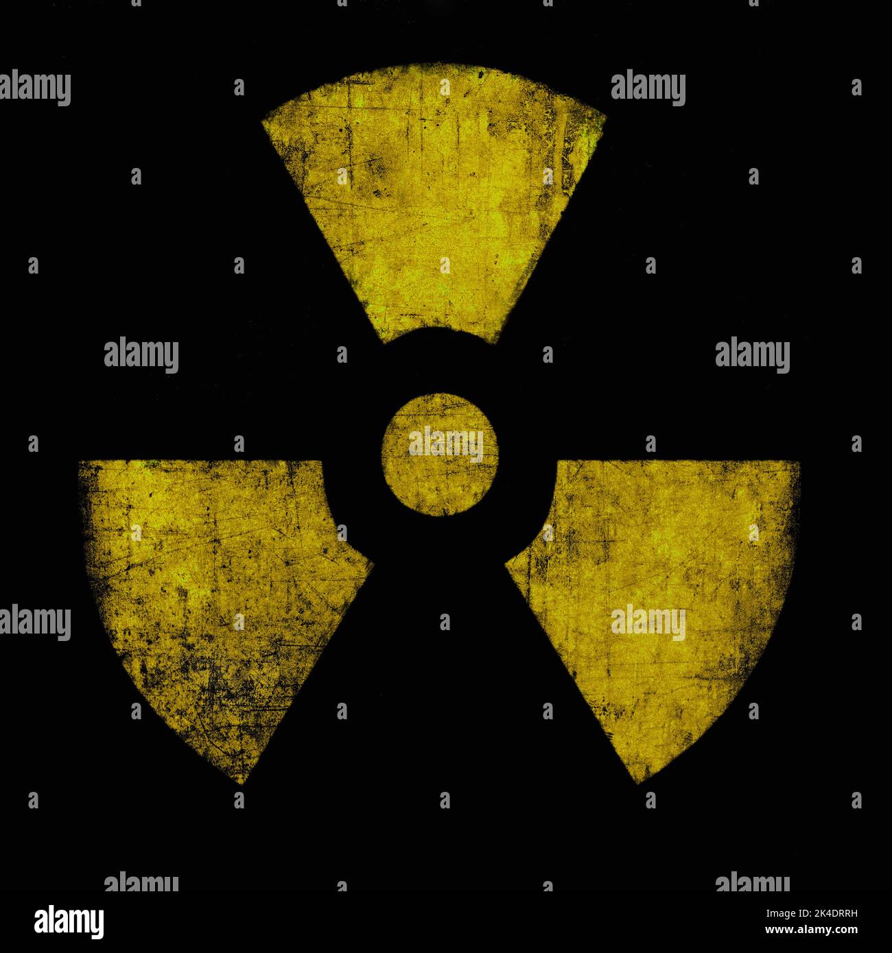 Signe de rayonnement, jaune sur noir. Symbole de danger nucléaire, texturé à la grunge. Symbole de menace radioactive Banque D'Images