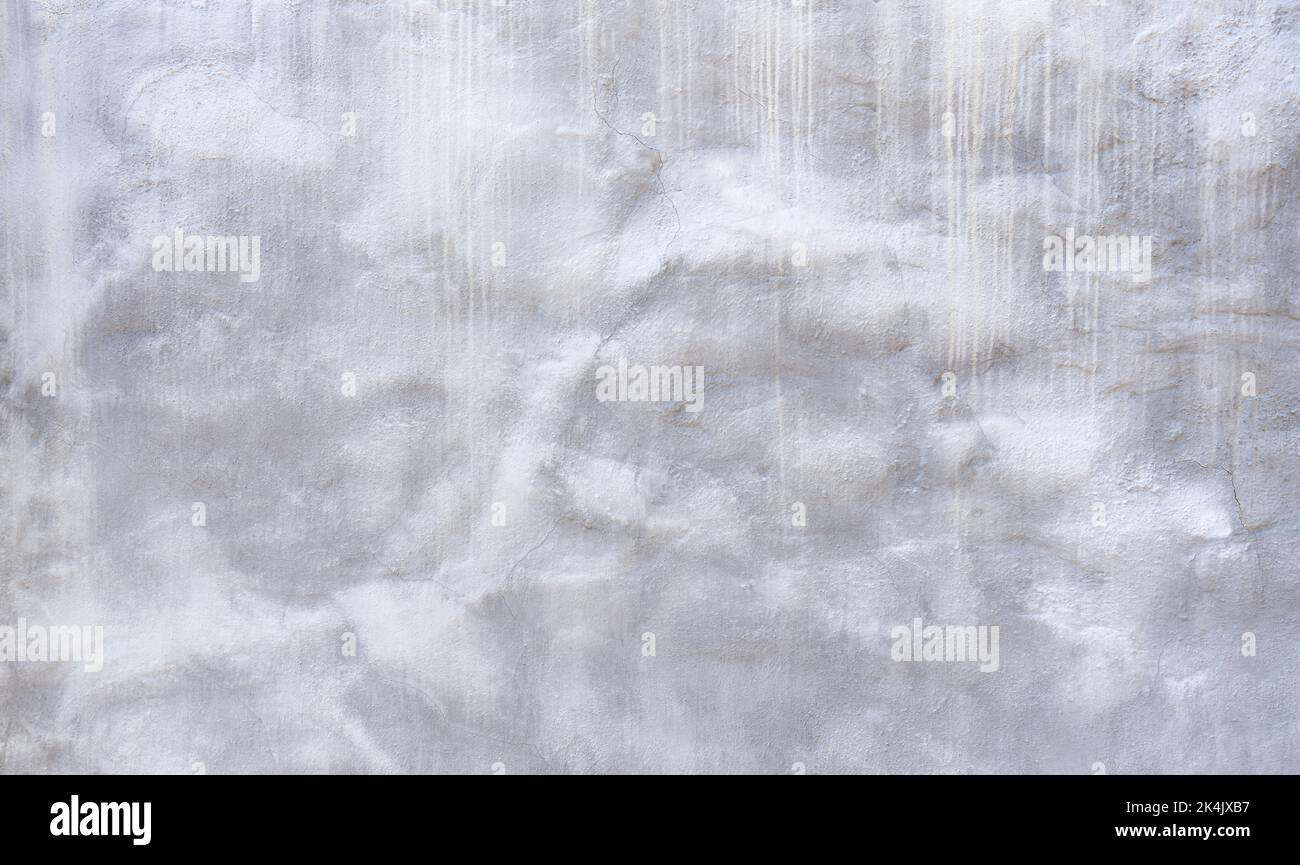 Détail d'un mur en plâtré avec motif abstrait gris blanc Banque D'Images