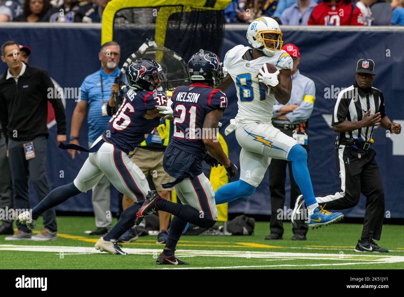 Houston Texans sécurité Jonathan Owens (36) et Houston Texans Corner back Steven Nelson (21) arrêter Los Angeles Chargers Wide Receiver Mike Williams (81) Banque D'Images