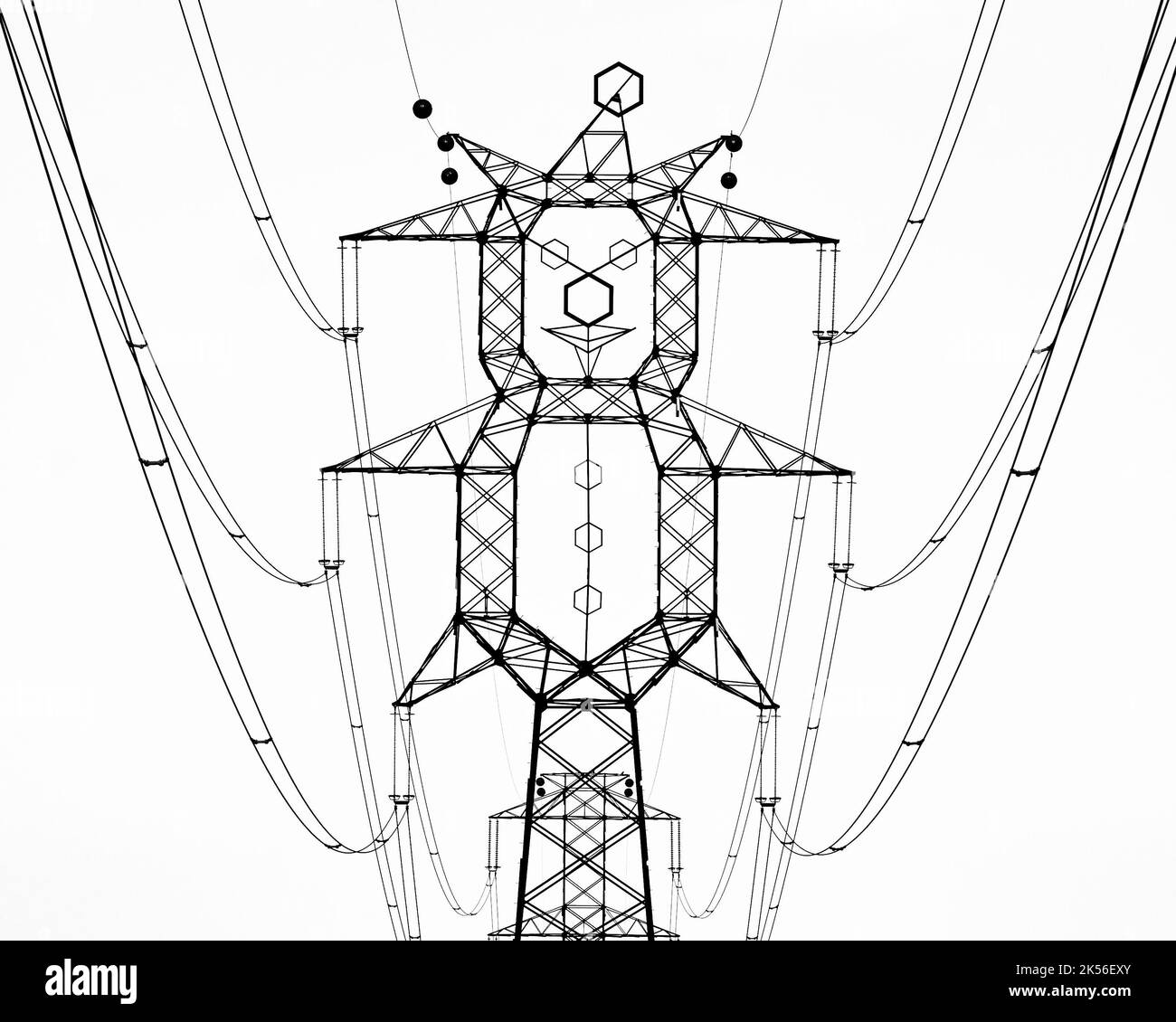 Lignes électriques haute tension en forme de clown Tour de transmission électrique haute tension à côté de l'autoroute M5 dans la ville de Pusztavacs hongrie Banque D'Images
