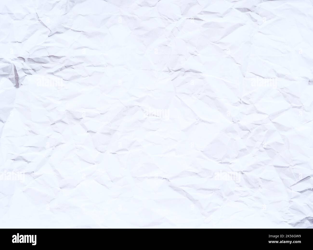 Arrière-plan de papier blanc froissé ou froissé comme texture abstraite Banque D'Images