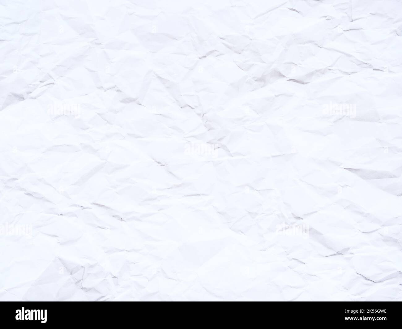 Arrière-plan de papier blanc froissé comme texture abstraite Banque D'Images