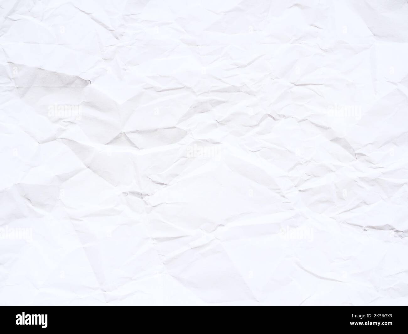 Arrière-plan abstrait de papier blanc froissé texturé Banque D'Images