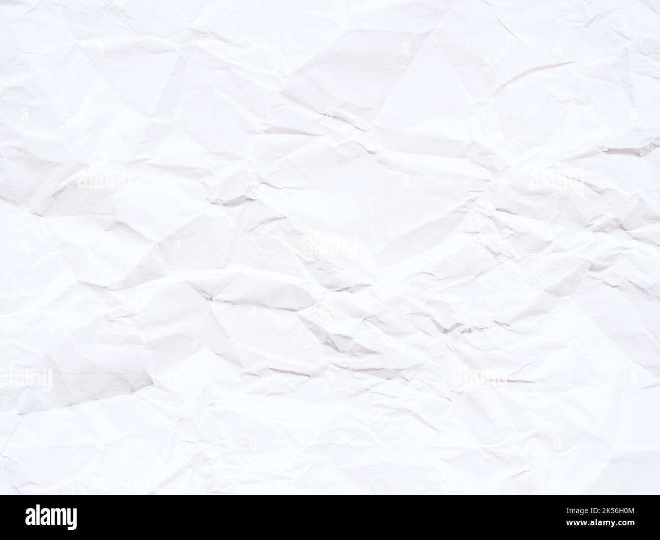 Arrière-plan abstrait de papier blanc froissé texturé Banque D'Images