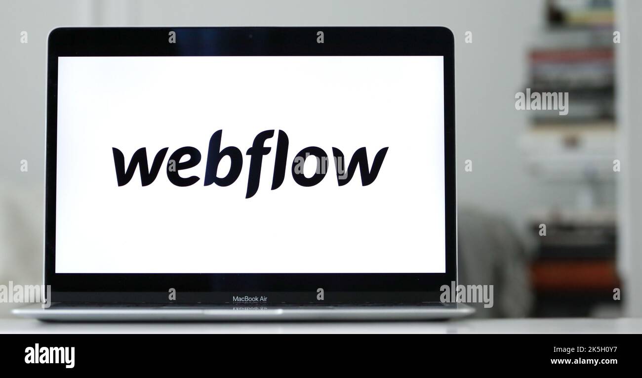 Le logo de Webflow, un constructeur de site Web américain, la plate-forme de conception, et la société d'hébergement Web, affiché sur un écran d'ordinateur portable Banque D'Images