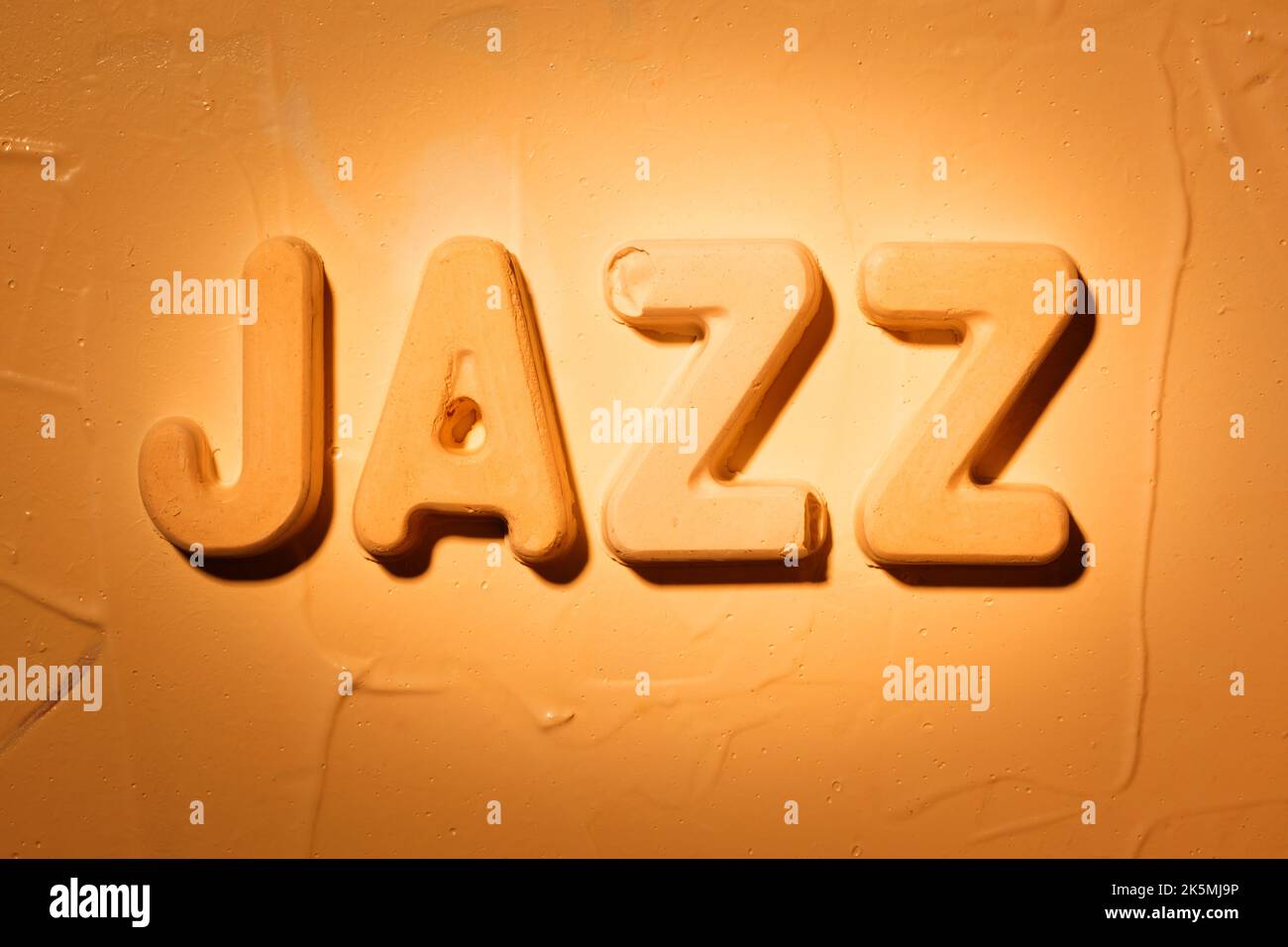 Jazz Word - lettres moulées sur stuc Banque D'Images