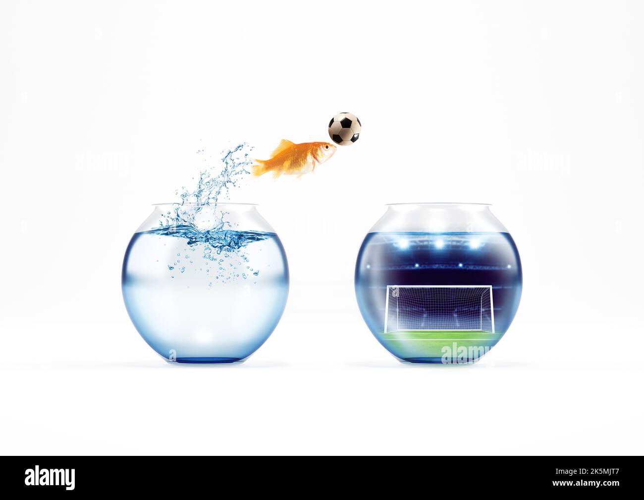 Le poisson rouge saute pour attraper une balle de football Banque D'Images