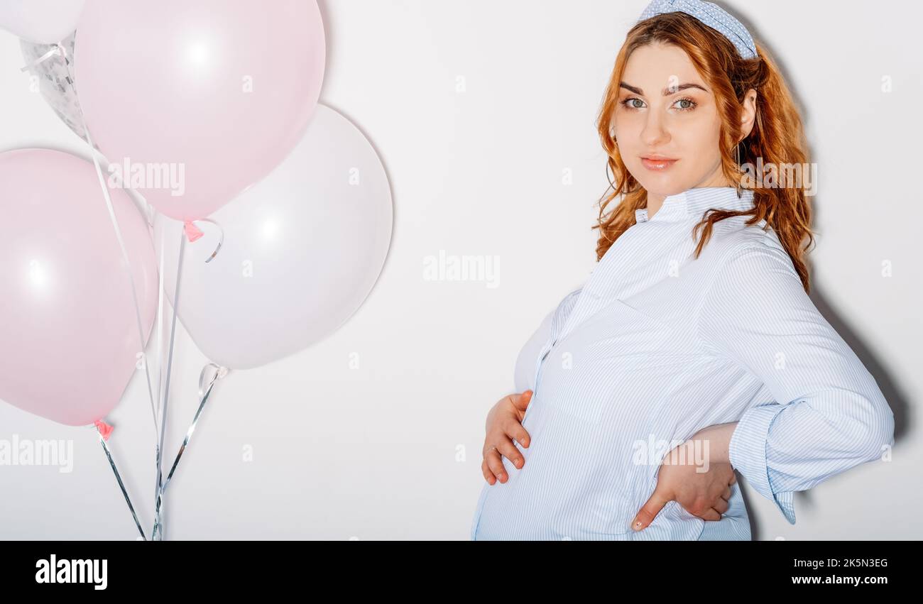 bonne grossesse tummy femme photo festive Banque D'Images