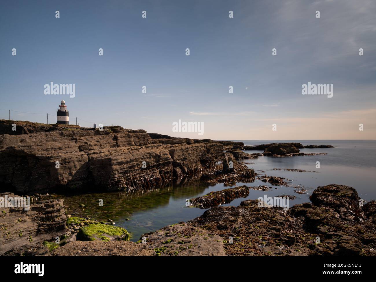 Vue sur le paysage de Hook Head et du phare historique du comté de Wexford Banque D'Images