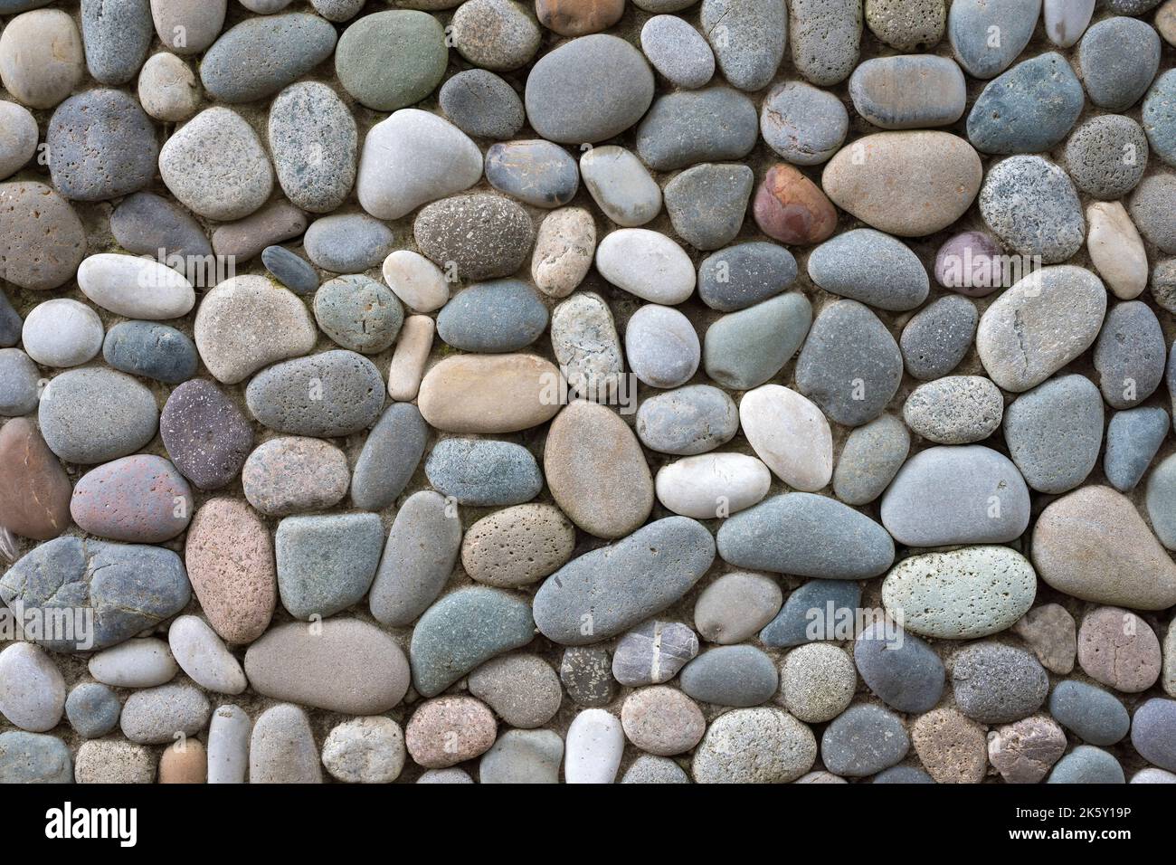Un arrière-plan abstrait de galets de mer Banque D'Images