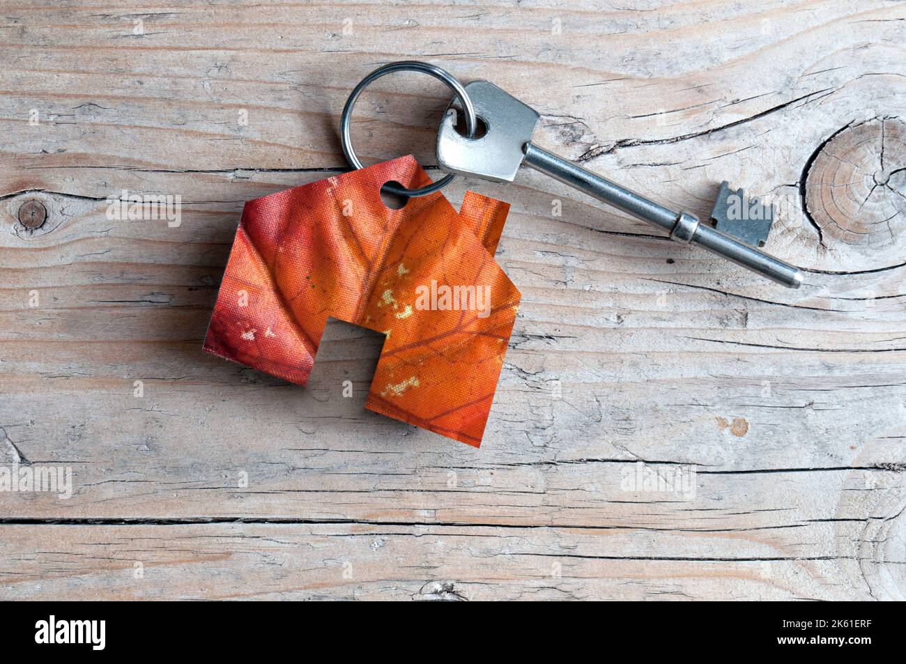 Miniature automne maison immobilière avec clé de fermeture Banque D'Images