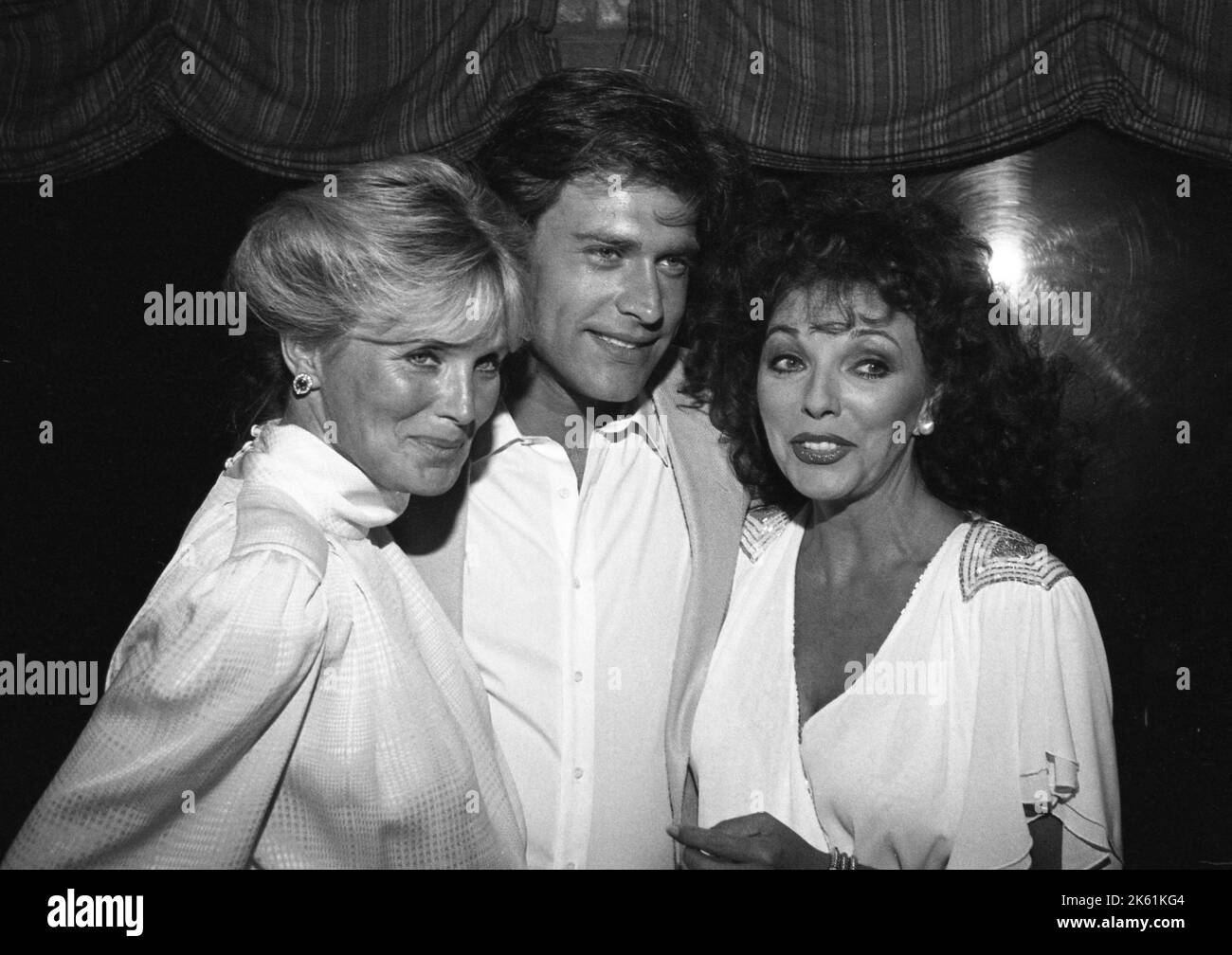 Linda Evans avec John James et Joan Collins à la famille Feud All-Star Premier Time cocktail spécial après la fête avec des acteurs de l'hôpital général, tous mes enfants, Dynasty et Knott's Landing sur 25 juillet 1982. Crédit: Ralph Dominguez/MediaPunch Banque D'Images