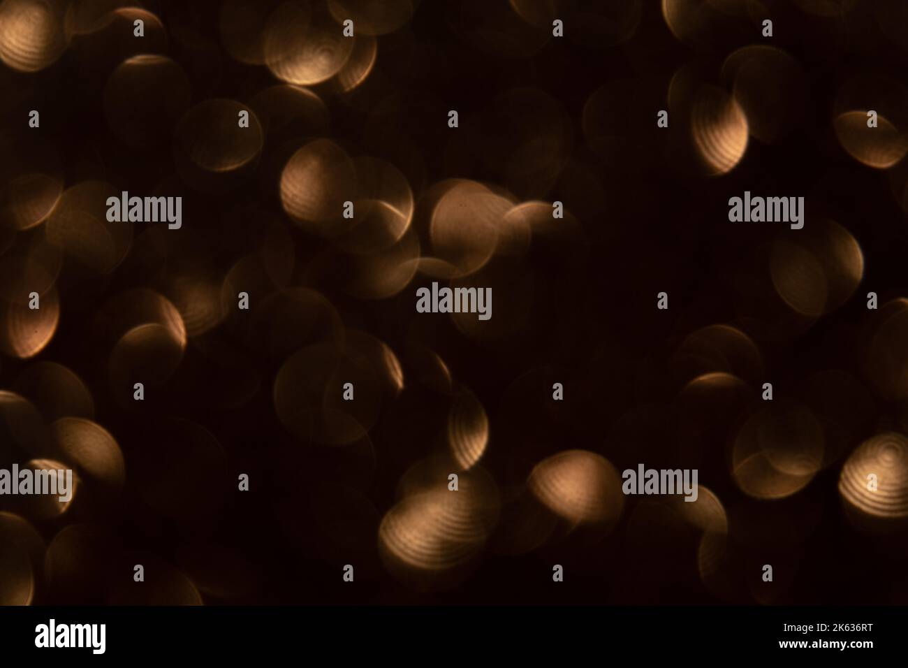 bokeh clair recouvrement cercle motif marron spot sombre Banque D'Images