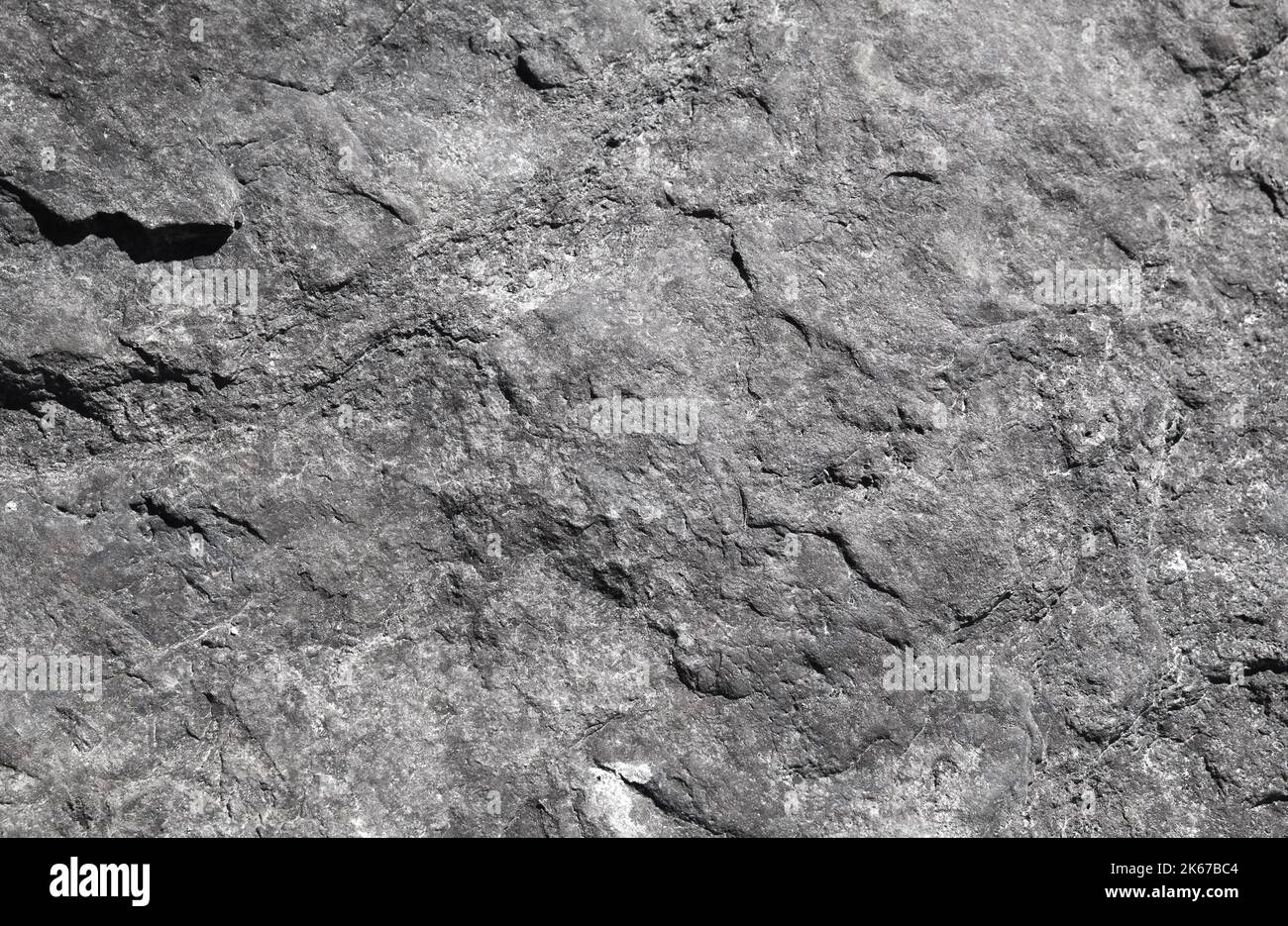 Texture abstraite de la photo d'arrière-plan du mur gris naturel de roche Banque D'Images