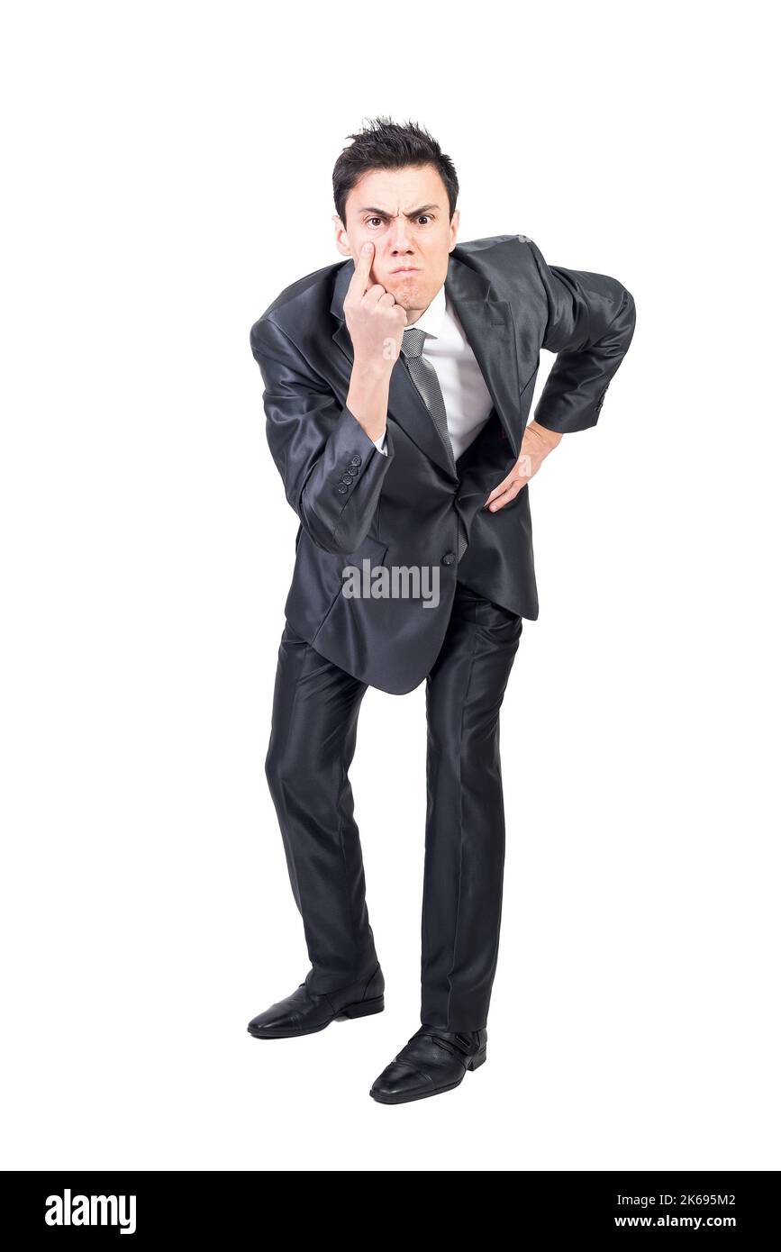 Un homme qui regarde la caméra avec concentration Banque D'Images