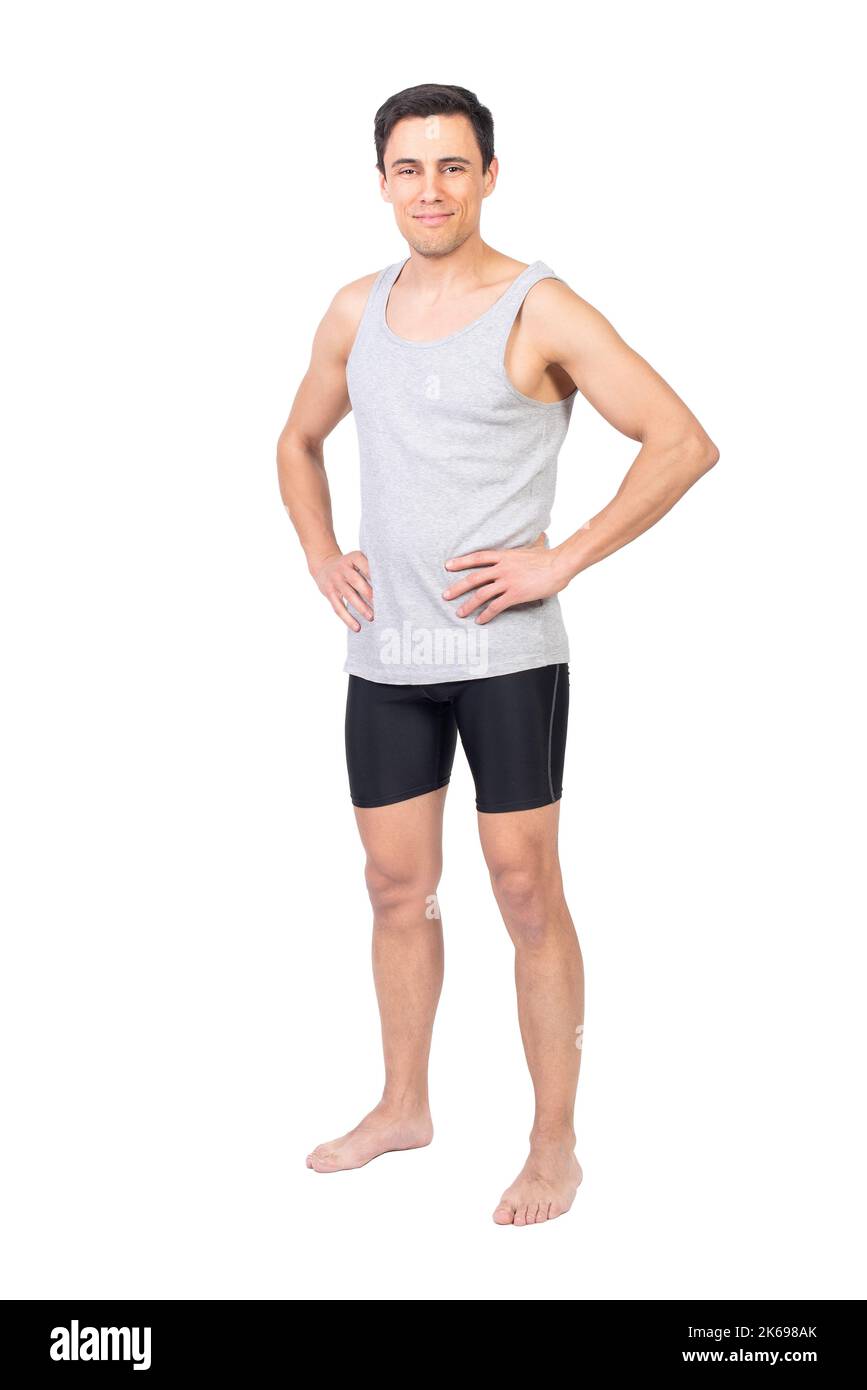 Un sportif positif dans les vêtements de sport debout en studio Banque D'Images