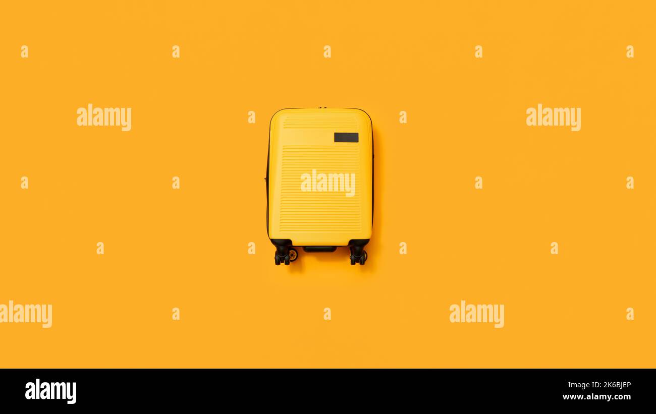 Plan de travail de la valise jaune des fêtes sur fond jaune Banque D'Images