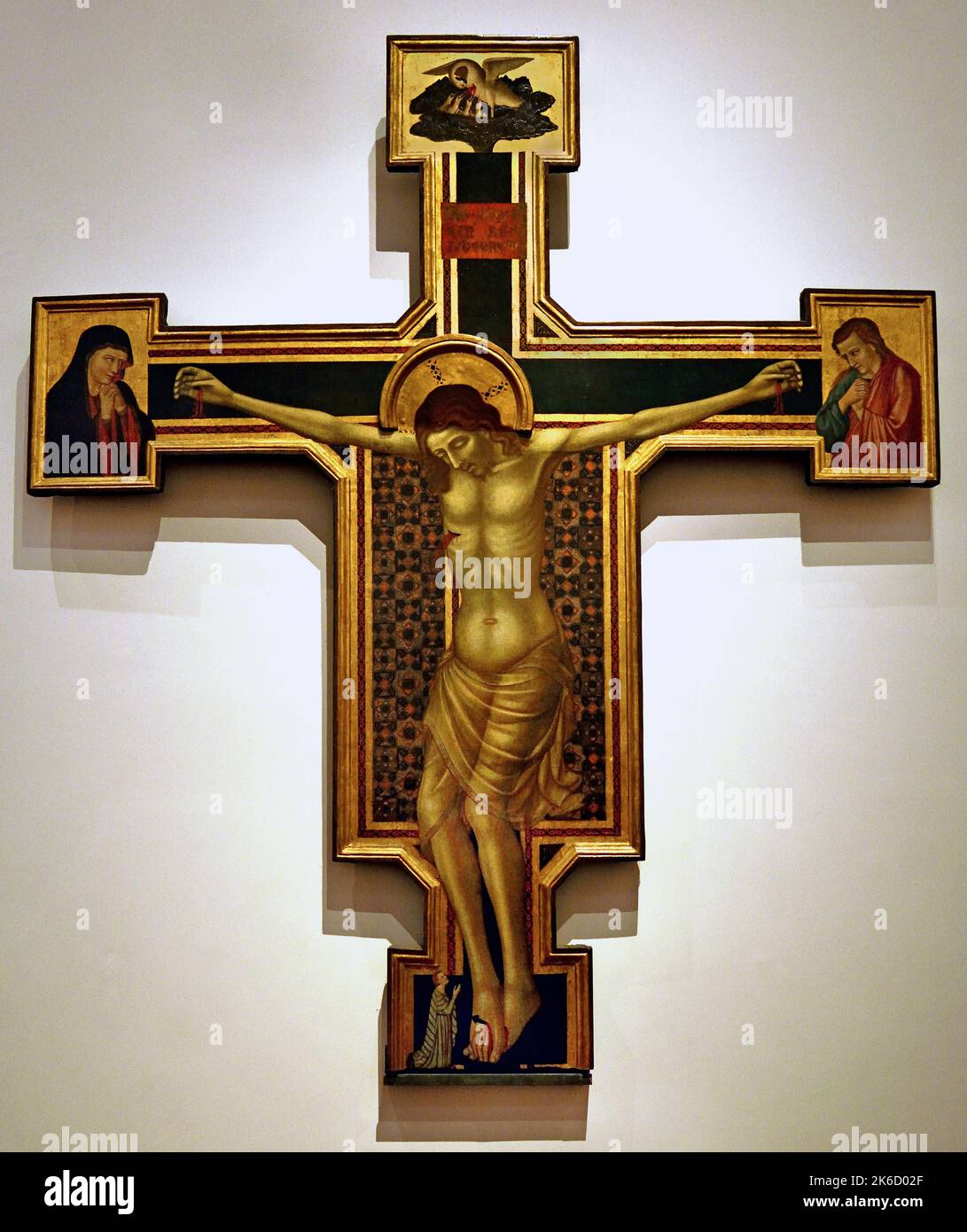 Christ crucifié, Maestro del Crocifisso Corsi, (Florence 1300-1325 c.) , Florence, Italie. ( Le Christ mort est montré avec son corps sans vie sur les genoux pliés, tenu en place par les ongles dans ses mains et ses pieds. ) Banque D'Images