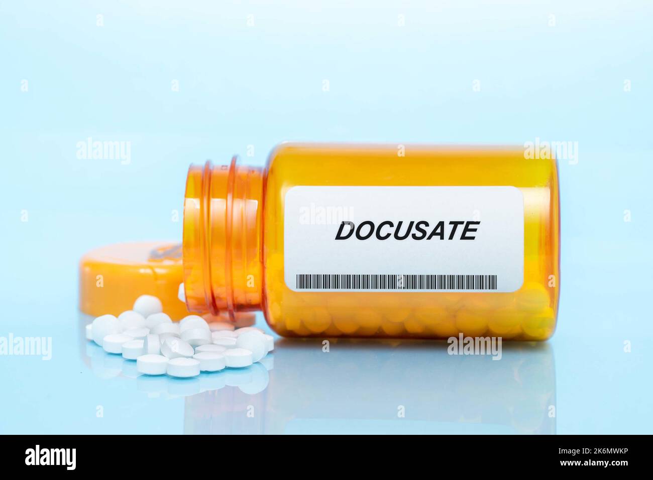 Bouteille de pilule de Docusate, image conceptuelle Banque D'Images