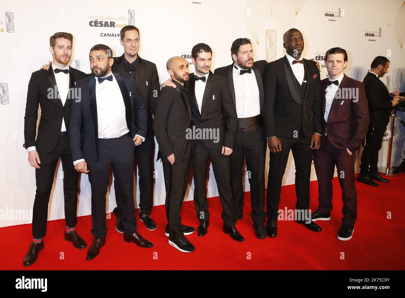 Le Grand corps Malade et son équipe arrivent aux Cesar film Awards 2018 à la salle Pleyel à Paris, en France. 02.03.2018 Banque D'Images