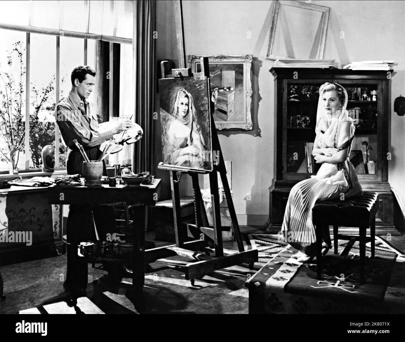 Mel Ferrer & Joan Fontaine film: Born to be Bad (USA 1950) personnages: Gobby, Christabel / Literaturverfilmung (basé sur le livre "All Kneeling" d'Anne Parrish) Directeur: Nicholas Ray 31 août 1950 **AVERTISSEMENT** cette photographie est destinée à un usage éditorial exclusif et est protégée par les droits d'auteur de RKO RADIO PICTURES et/ou du photographe assigné par la Société de film ou de production et ne peut être reproduite que par des publications en conjonction avec la promotion du film ci-dessus. Un crédit obligatoire pour LES IMAGES DE LA RADIO RKO est requis. Le photographe doit également être crédité lorsqu'il est connu. Aucune utilisation commerciale ne peut être accordée Banque D'Images