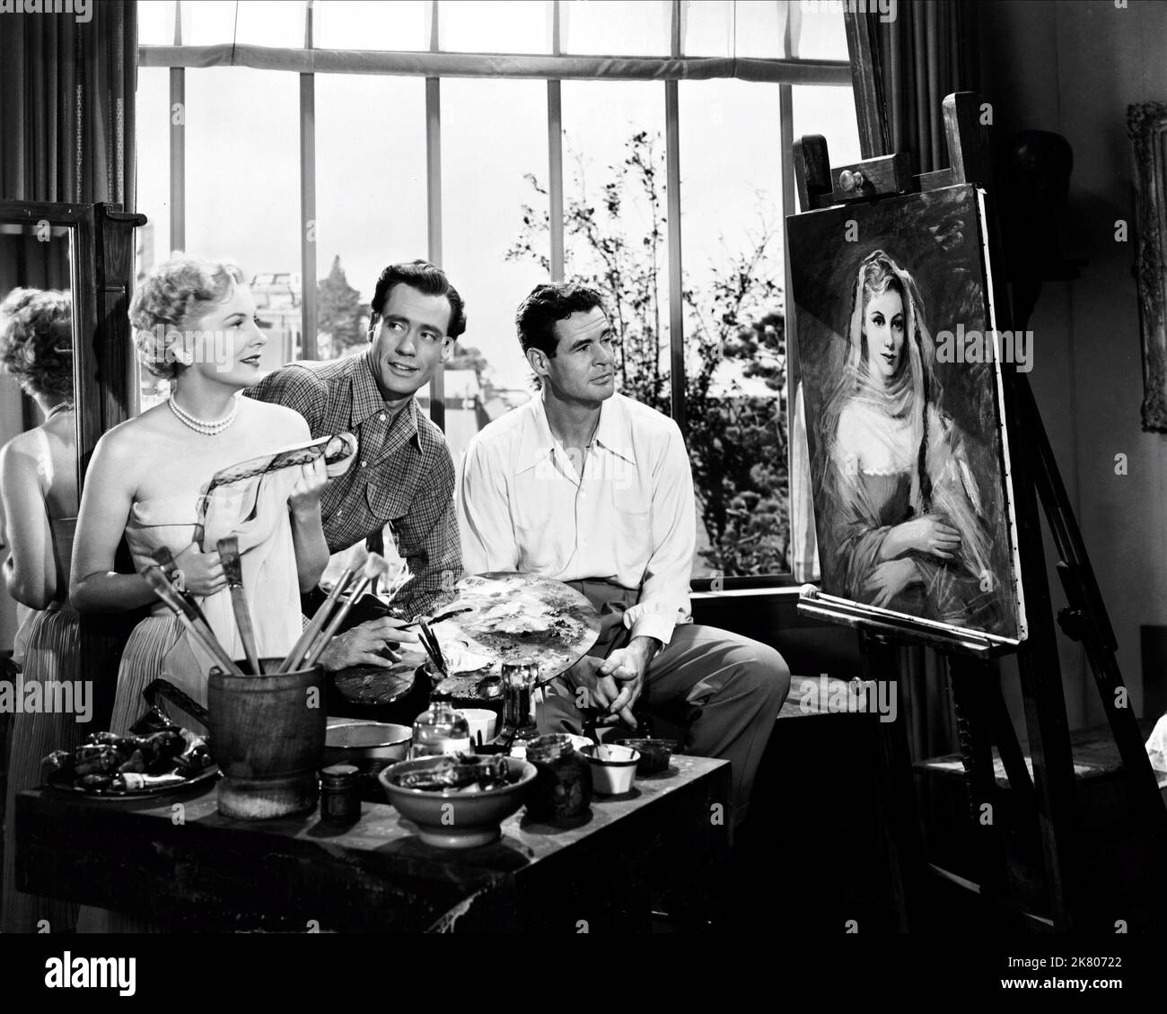 Joan Fontaine, Mel Ferrer & Robert Ryan film: Born to be Bad (USA 1950) personnages: Christabel, Gobby, Nick / Literaturverfilmung (basé sur le livre "All Kneeling" d'Anne Parrish) Directeur: Nicholas Ray 31 août 1950 **AVERTISSEMENT** cette photographie est destinée à un usage éditorial exclusif et est protégée par les droits d'auteur de RKO RADIO PICTURES et/ou du photographe assigné par la Société de film ou de production et ne peut être reproduite que par des publications en conjonction avec la promotion du film ci-dessus. Un crédit obligatoire pour LES IMAGES DE LA RADIO RKO est requis. Le photographe doit également être crédité lorsqu'il est connu. Pas de problème Banque D'Images