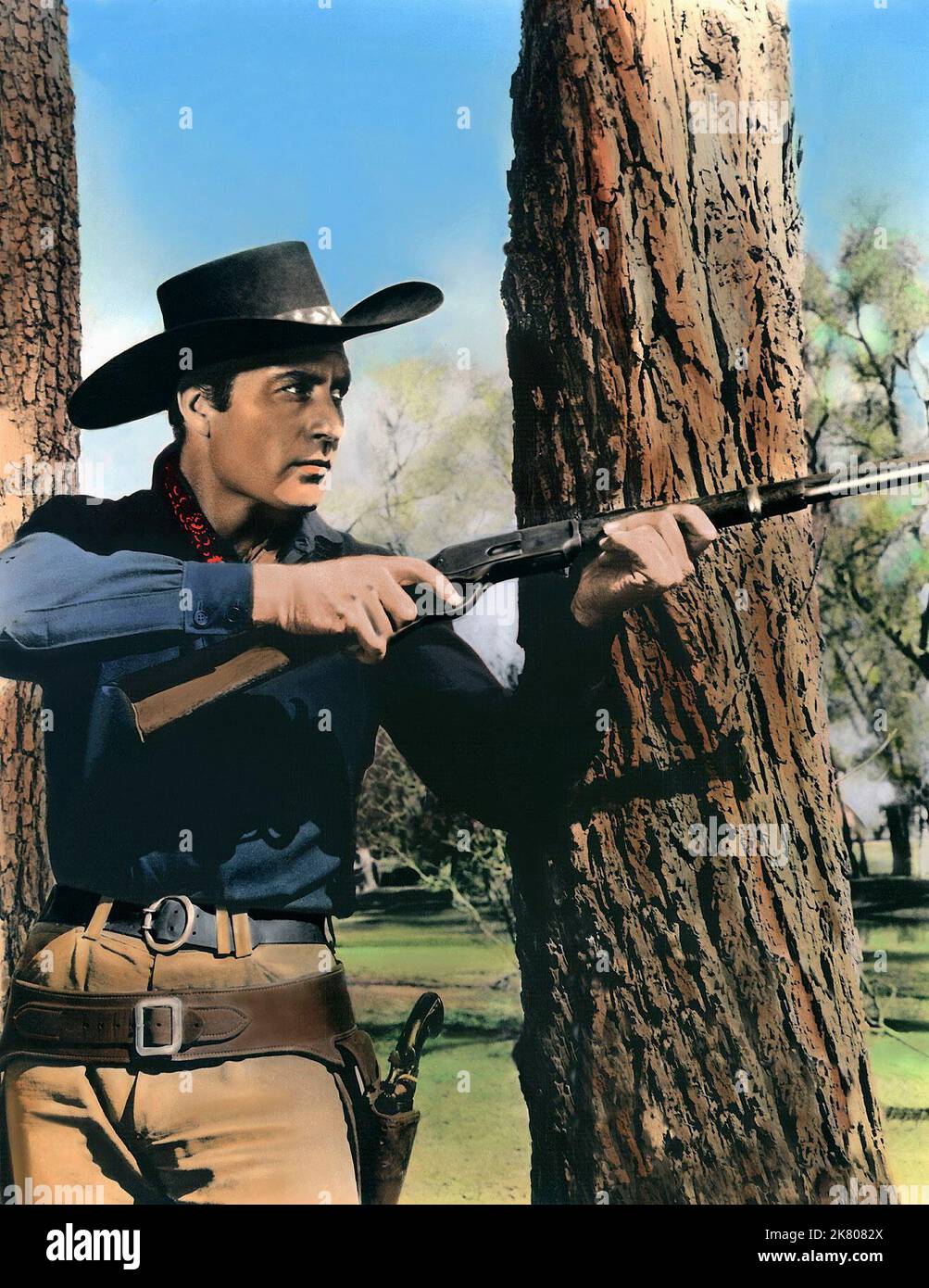 George Montgomery film Robber'S Roost (1950) personnages : 'Tex' aka Jim Wall réalisateur : Sidney Salkow 30 mai 1955 **AVERTISSEMENT** cette photographie est à usage éditorial seulement et est la propriété de ROB et/ou du photographe assigné par The film or production Company et ne peut être reproduite que par des publications en conjonction avec la promotion du film ci-dessus. Un crédit obligatoire pour ROB est requis. Le photographe doit également être crédité lorsqu'il est connu. Aucune utilisation commerciale ne peut être accordée sans autorisation écrite de The film Company. Banque D'Images