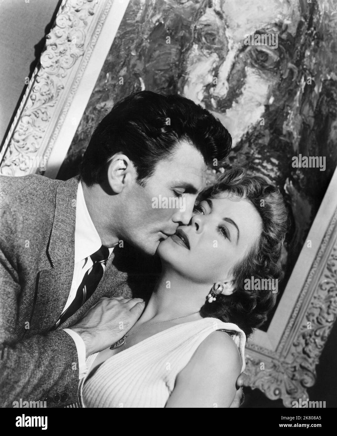 Jack Palance & Ida Lupino film: The Big Knife: Hollywood Story (1950) personnages: Charles Castle & Marion Castle Directeur: Robert Aldrich 08 novembre 1955 **AVERTISSEMENT** cette photographie est à usage éditorial exclusif et est le droit d'auteur des ARTISTES UNIS et/ou du photographe assigné par la Société du film ou de la production et ne peut être reproduite que par des publications dans le cadre de la promotion du film ci-dessus. Un crédit obligatoire pour LES ARTISTES UNIS est requis. Le photographe doit également être crédité lorsqu'il est connu. Aucune utilisation commerciale ne peut être accordée sans l'autorisation écrite de la Société du film. Banque D'Images