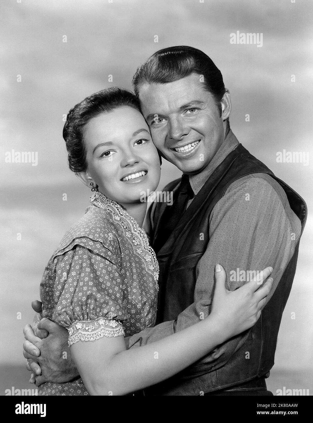 Joan Evans & Audie Murphy film No Name on the Bullet (1954) personnages : Anne Benson & John gant 01 février 1959 **AVERTISSEMENT** cette photographie est à usage éditorial seulement et est la propriété d'UNIVERSAL et/ou du photographe assigné par le film ou la société de production et ne peut être reproduite que par des publications en liaison avec la promotion du film ci-dessus. Un crédit obligatoire pour UNIVERSAL est requis. Le photographe doit également être crédité lorsqu'il est connu. Aucune utilisation commerciale ne peut être accordée sans autorisation écrite de The film Company. Banque D'Images