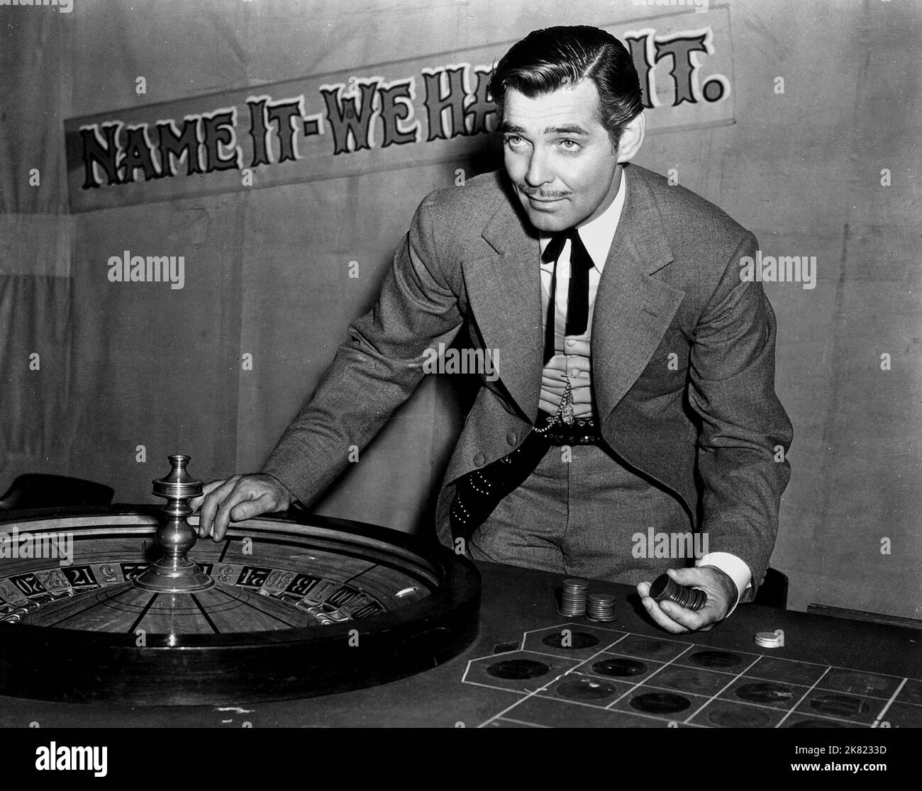 Clark Gable film Honky Tonk (USA 1941) personnages : 'Candy' Johnson réalisateur : Jack Conway 01 octobre 1941 **AVERTISSEMENT** cette photographie est à usage éditorial exclusif et est la propriété de MGM et/ou du photographe désigné par la société de production et ne peut être reproduite que par des publications en liaison avec la promotion du film ci-dessus. Un crédit obligatoire à MGM est requis. Le photographe doit également être crédité lorsqu'il est connu. Aucune utilisation commerciale ne peut être accordée sans autorisation écrite de The film Company. Banque D'Images