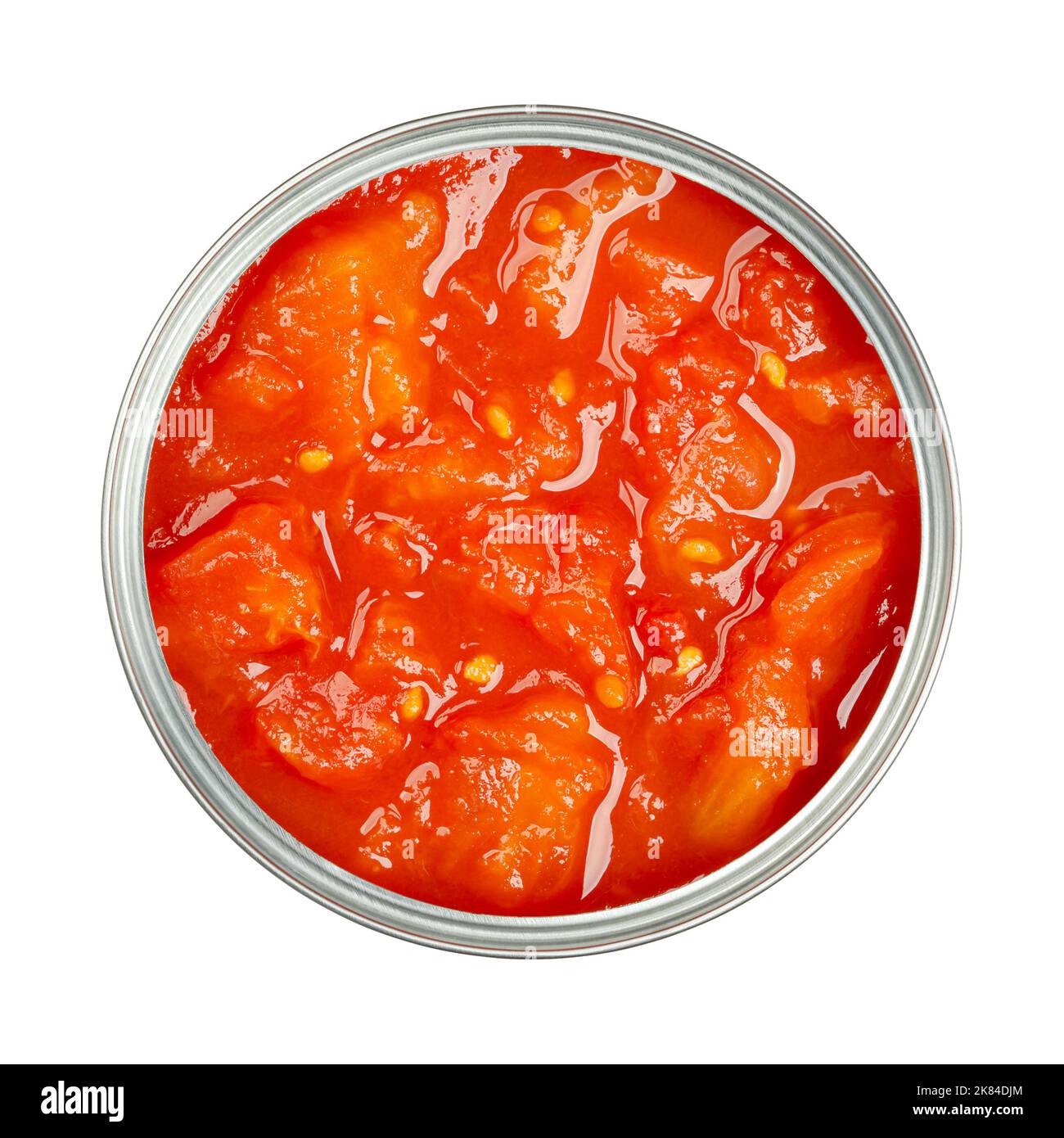 Tomates en conserve coupées en dés, avec purée de tomates, dans une boîte ouverte. Tomates hachées et sauce tomate. Morceaux de tomate, scellés dans une conserve. Banque D'Images