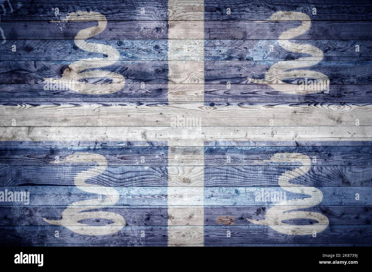 Une vignetted image de fond du drapeau de la Martinique peints sur des planches de bois d'un mur ou le plancher. Banque D'Images