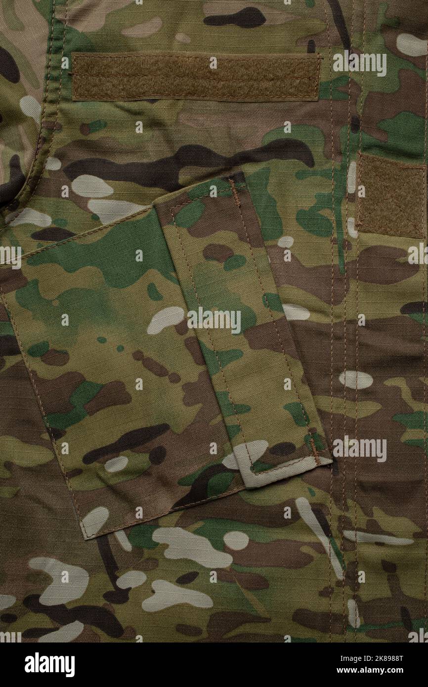 Toile de fond de la texture du tissu camouflage multiple de force armée. Banque D'Images