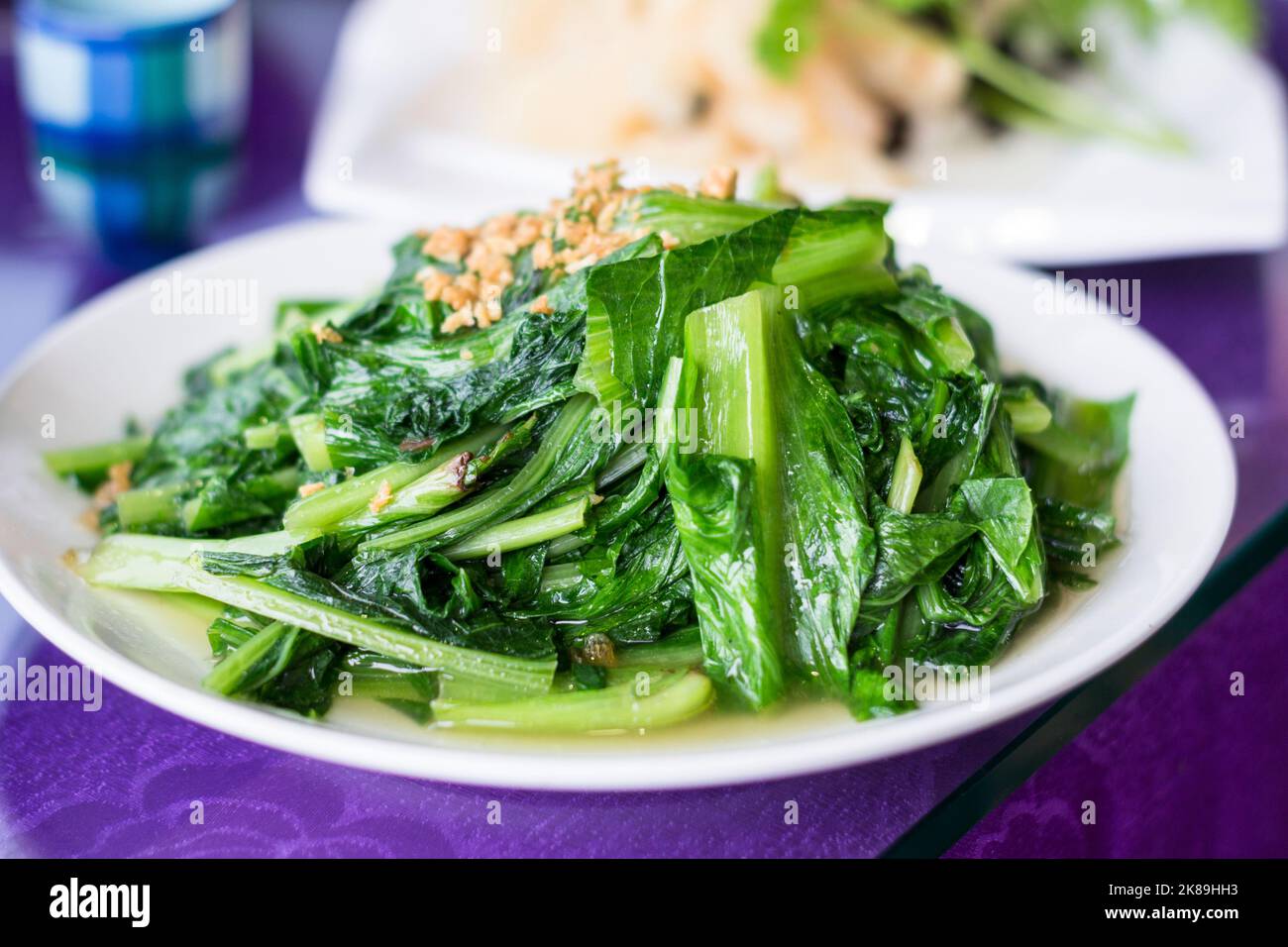 Légumes verts cuits à la vapeur dans un restaurant à Taipei, Taiwan Banque D'Images