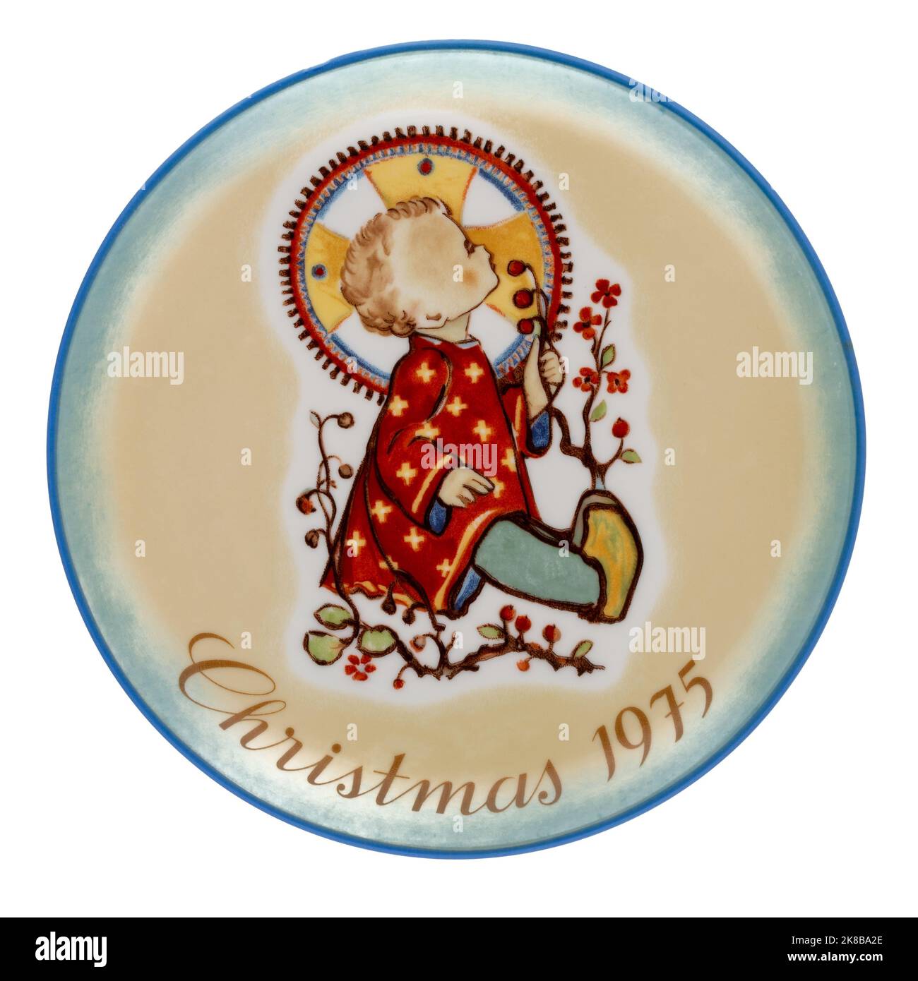 Assiette de Noël vintage sœur Berta Hummel de 1975 intitulée enfant de Noël, isolée sur blanc. Banque D'Images