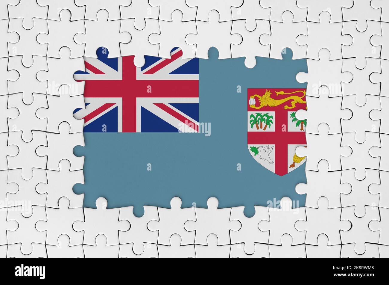 Drapeau des Fidji dans le cadre de pièces de puzzle blanc avec des pièces centrales manquantes Banque D'Images