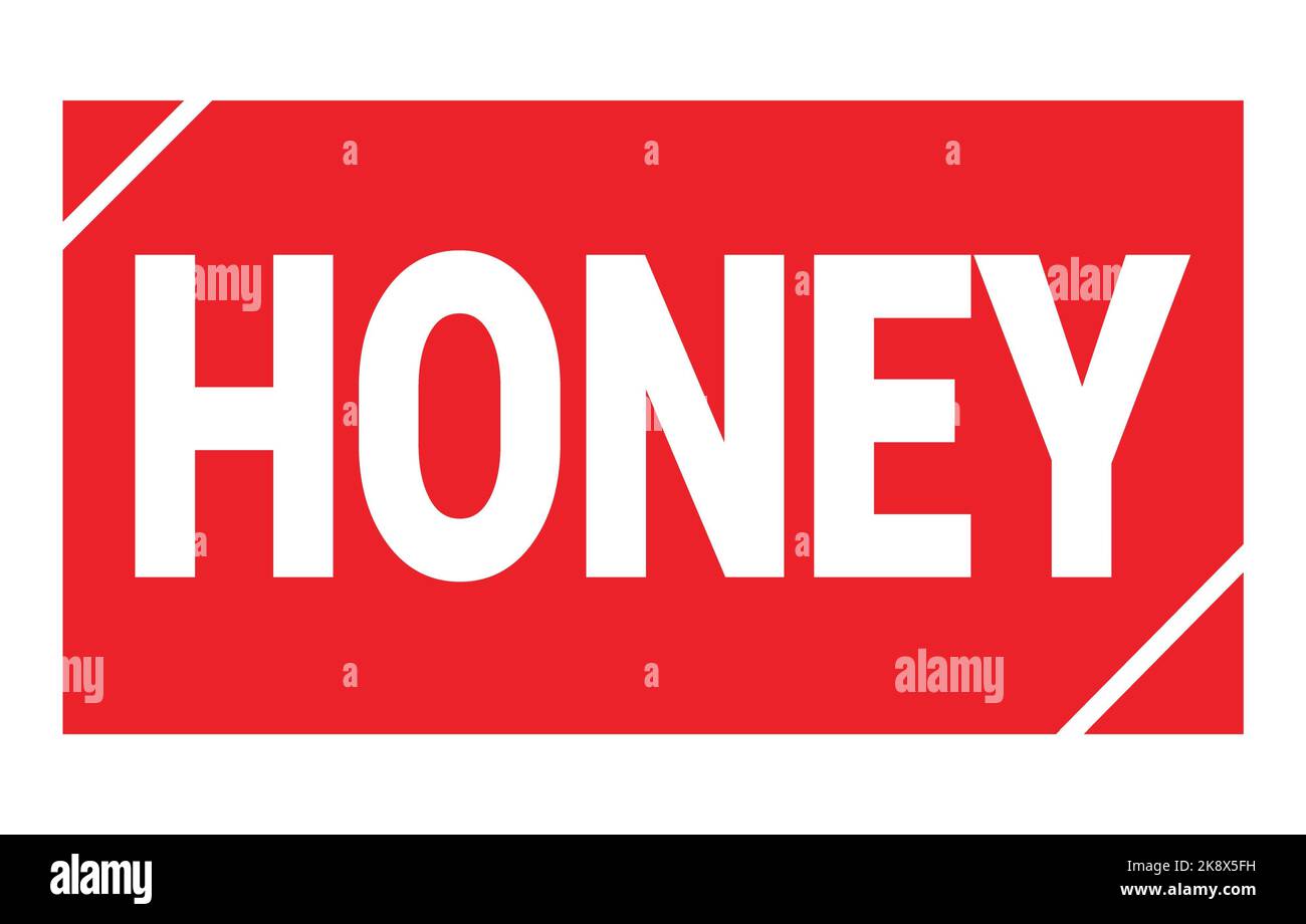 Texte EN MIEL inscrit sur le signe rouge du timbre rectangle. Banque D'Images