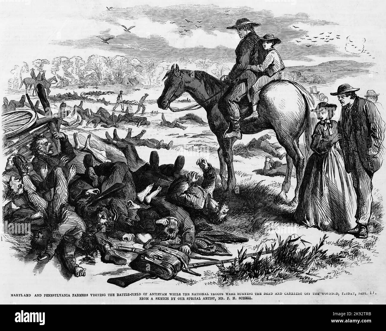 Les fermiers du Maryland et de Pennsylvanie visitant le champ de bataille d'Antietam tandis que les troupes nationales enterraient les morts et transportaient les blessés, vendredi, 19 septembre 1862. Illustration de la guerre de Sécession américaine du 19th siècle tirée du journal illustré de Frank Leslie Banque D'Images