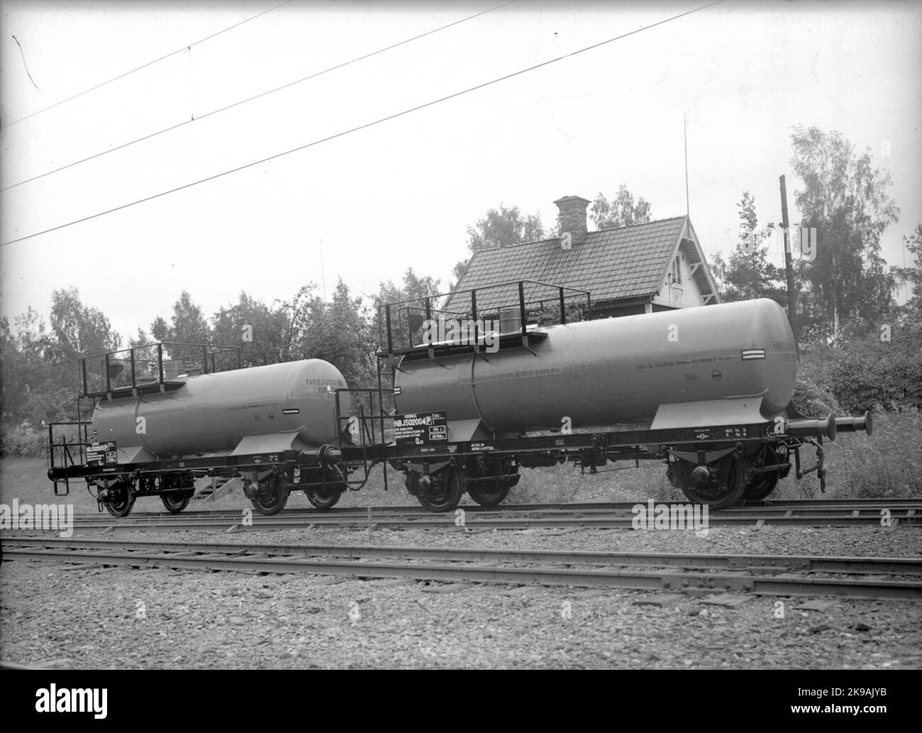 Chemin de fer de Nora Bergslags, NBJ Q12 502004, 502005. Wagons acides avec réservoir en aluminium pour l'acide nitrique. Banque D'Images