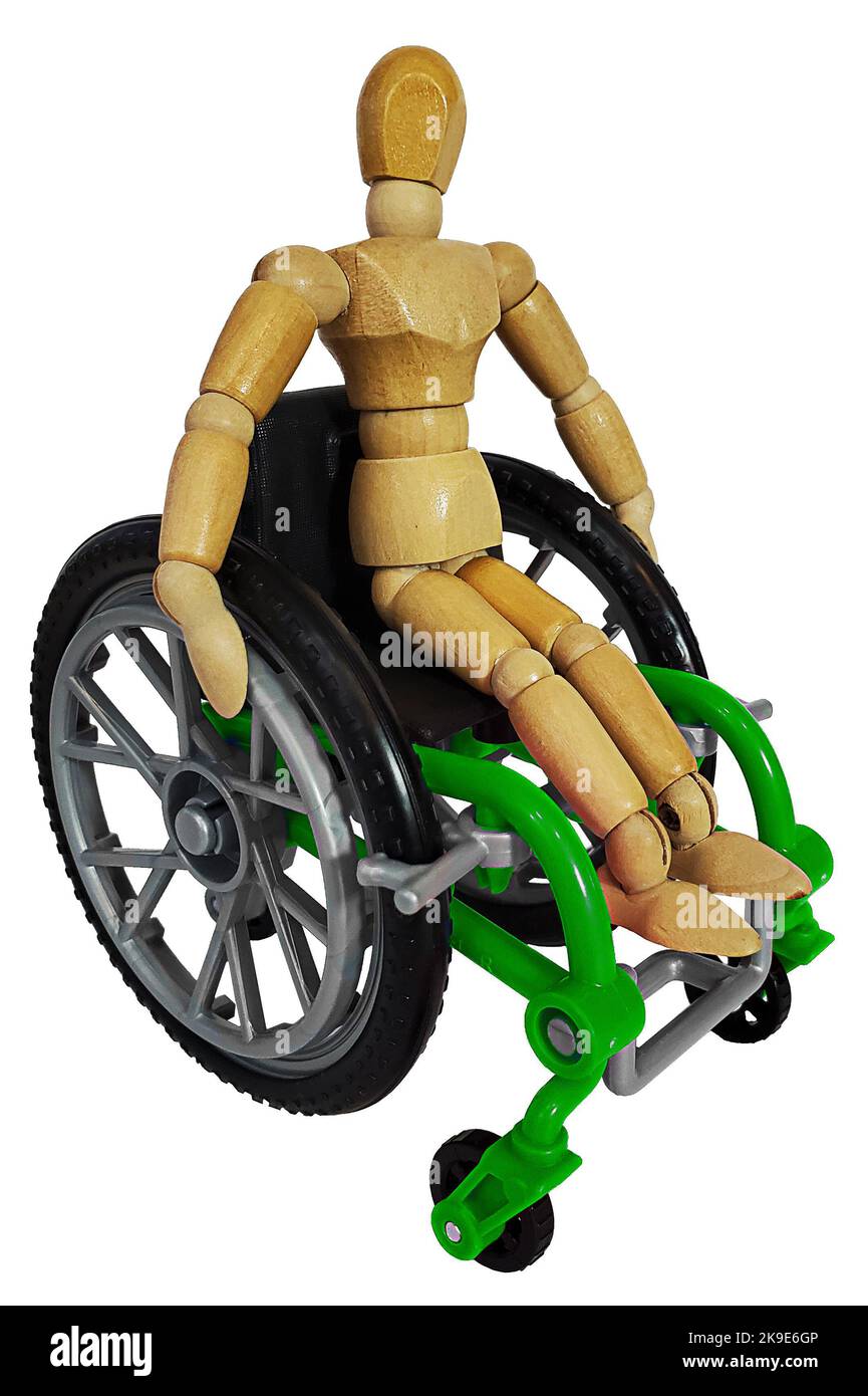 Personne dans un fauteuil roulant vert Banque D'Images
