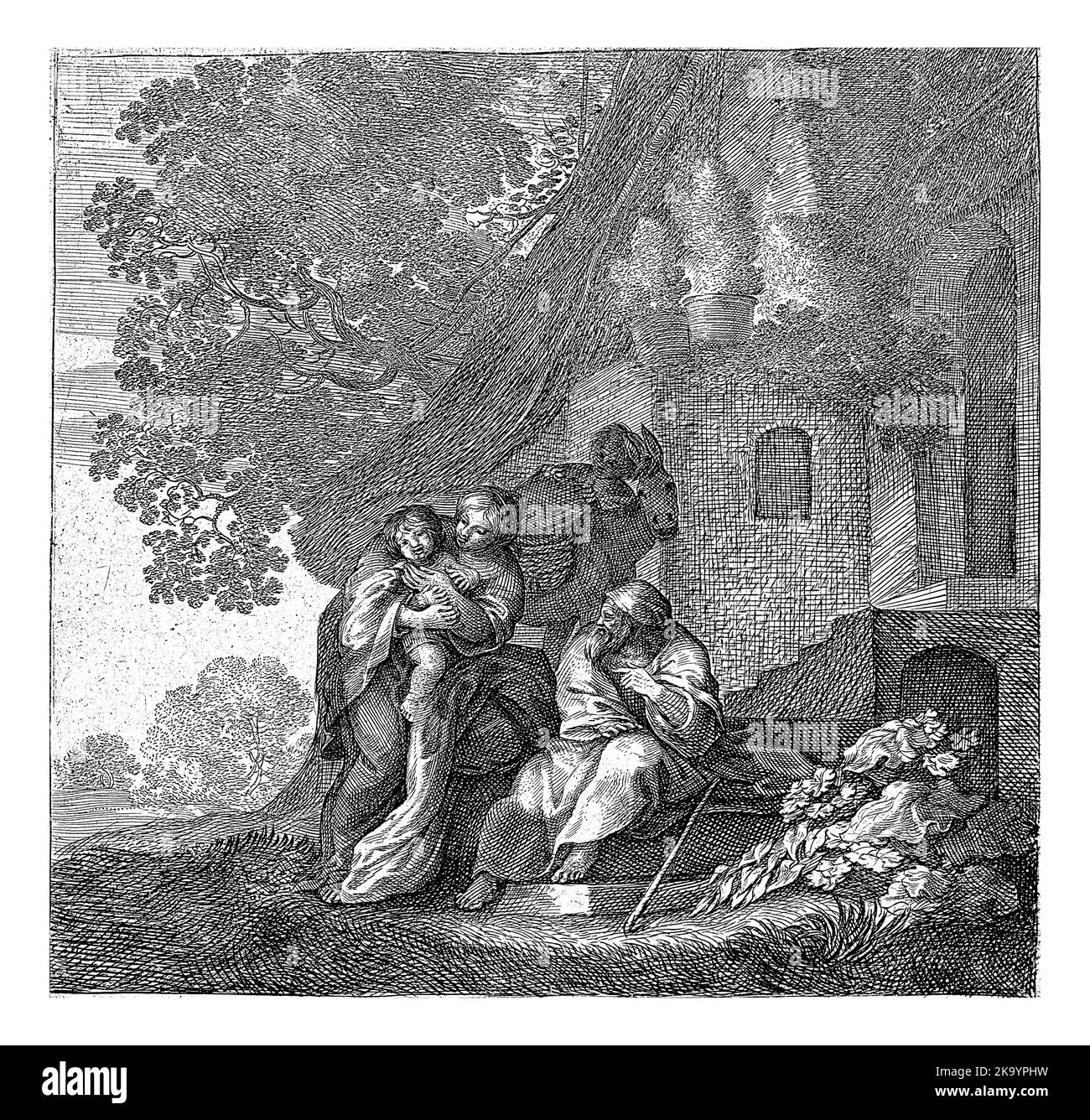 Marie se tient devant une maison de chaume avec l'enfant Christ sur son bras. Banque D'Images